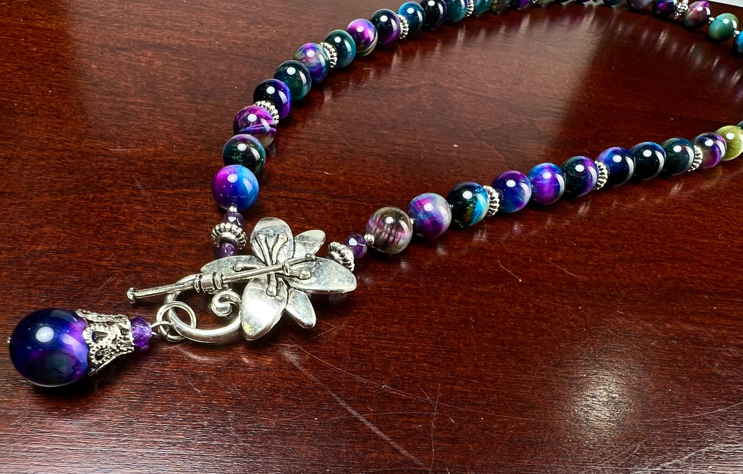 Galaxy Tiger Eye 8mm smooth round AAA quality with matching pendant Bali style spacer and flower toggle necklace. Strength