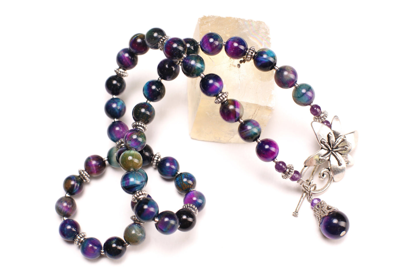 Galaxy Tiger Eye 8mm smooth round AAA quality with matching pendant Bali style spacer and flower toggle necklace. Strength