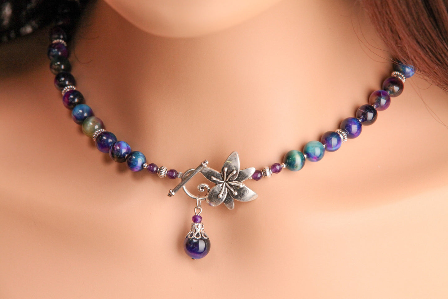 Galaxy Tiger Eye 8mm smooth round AAA quality with matching pendant Bali style spacer and flower toggle necklace. Strength