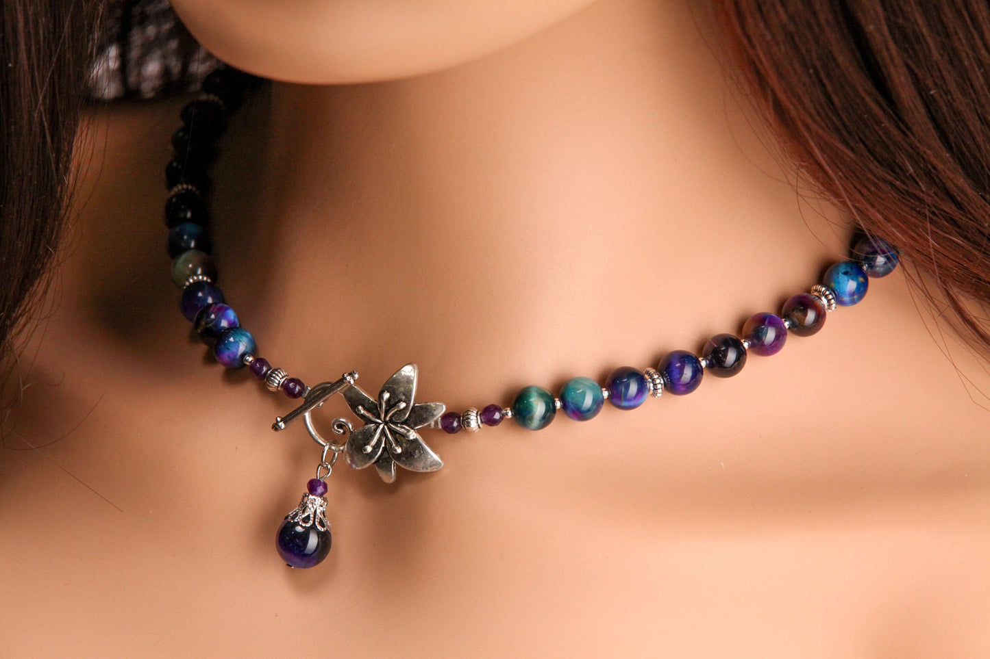 Galaxy Tiger Eye 8mm smooth round AAA quality with matching pendant Bali style spacer and flower toggle necklace. Strength