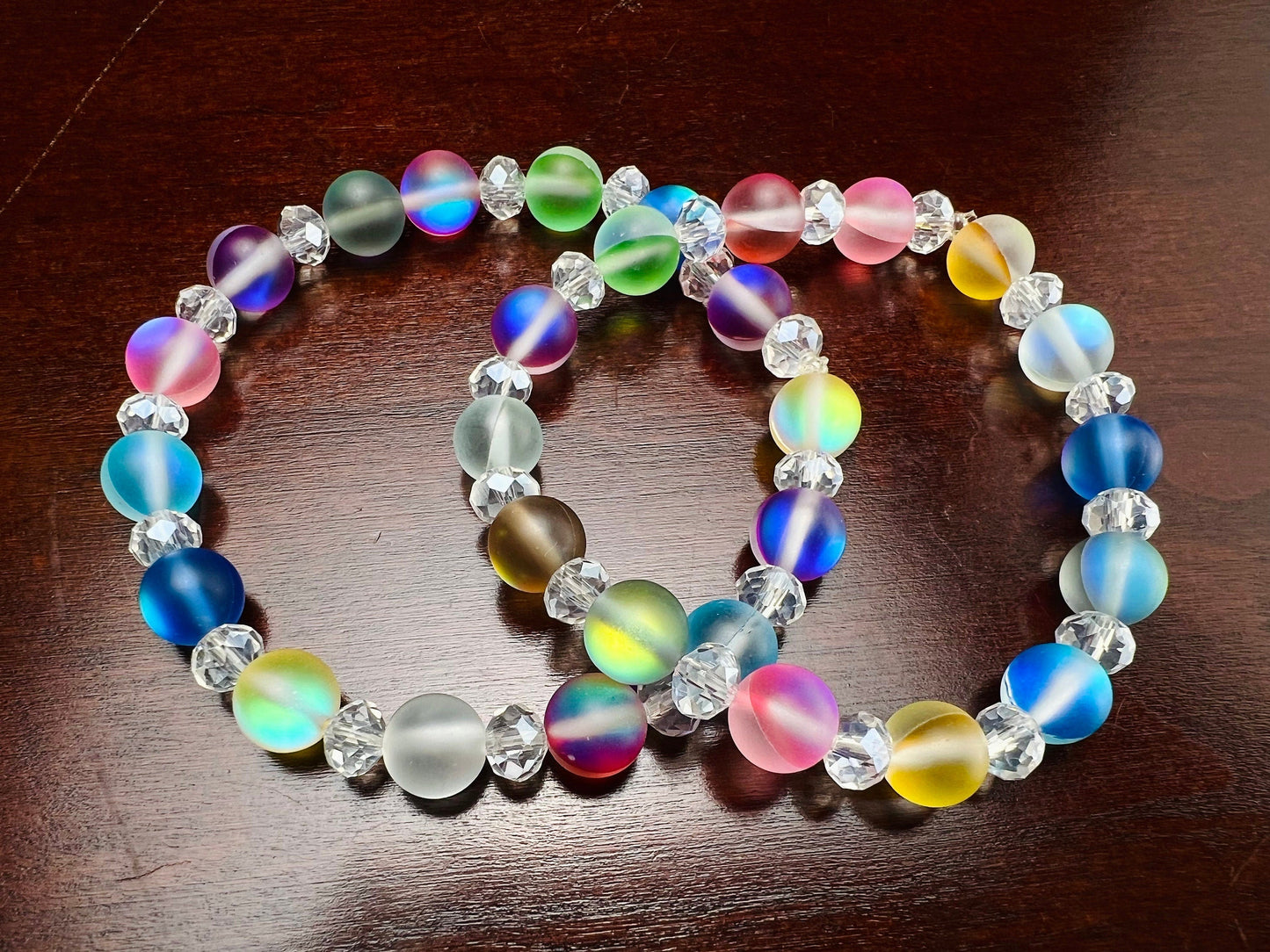 Multi color Angel Aura Quartz Mermaid Glow bead 8mm Matte smooth round bead accents with sparkly crystal roundel stretchy Bracelet. Rainbow