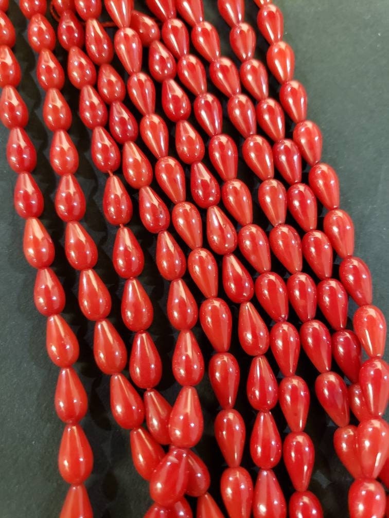Red Coral 5x9mm Teardrop Shape Briolette Beads. 15.5", Approx. 45 pcs