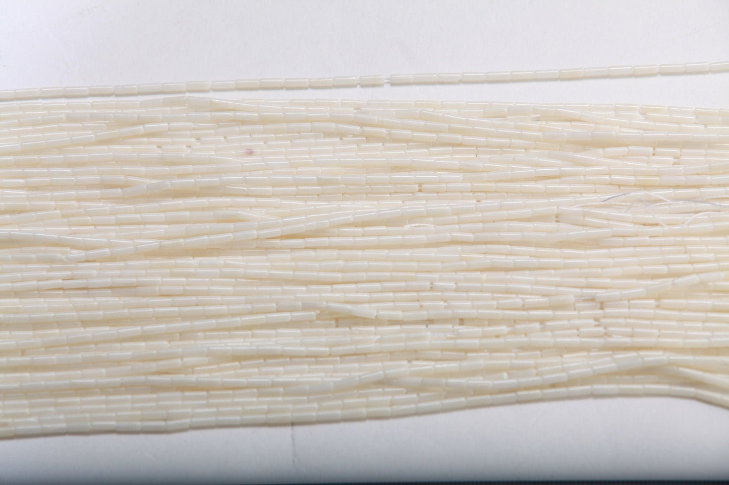 White Bamboo Coral 2x5mm Tube 16" Strand