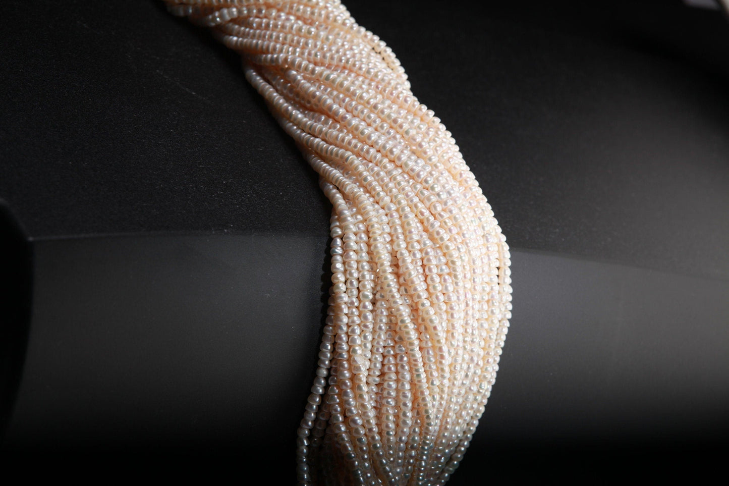 Natural Freshwater Pearl 3x4.5mm Roundel 14” full strand