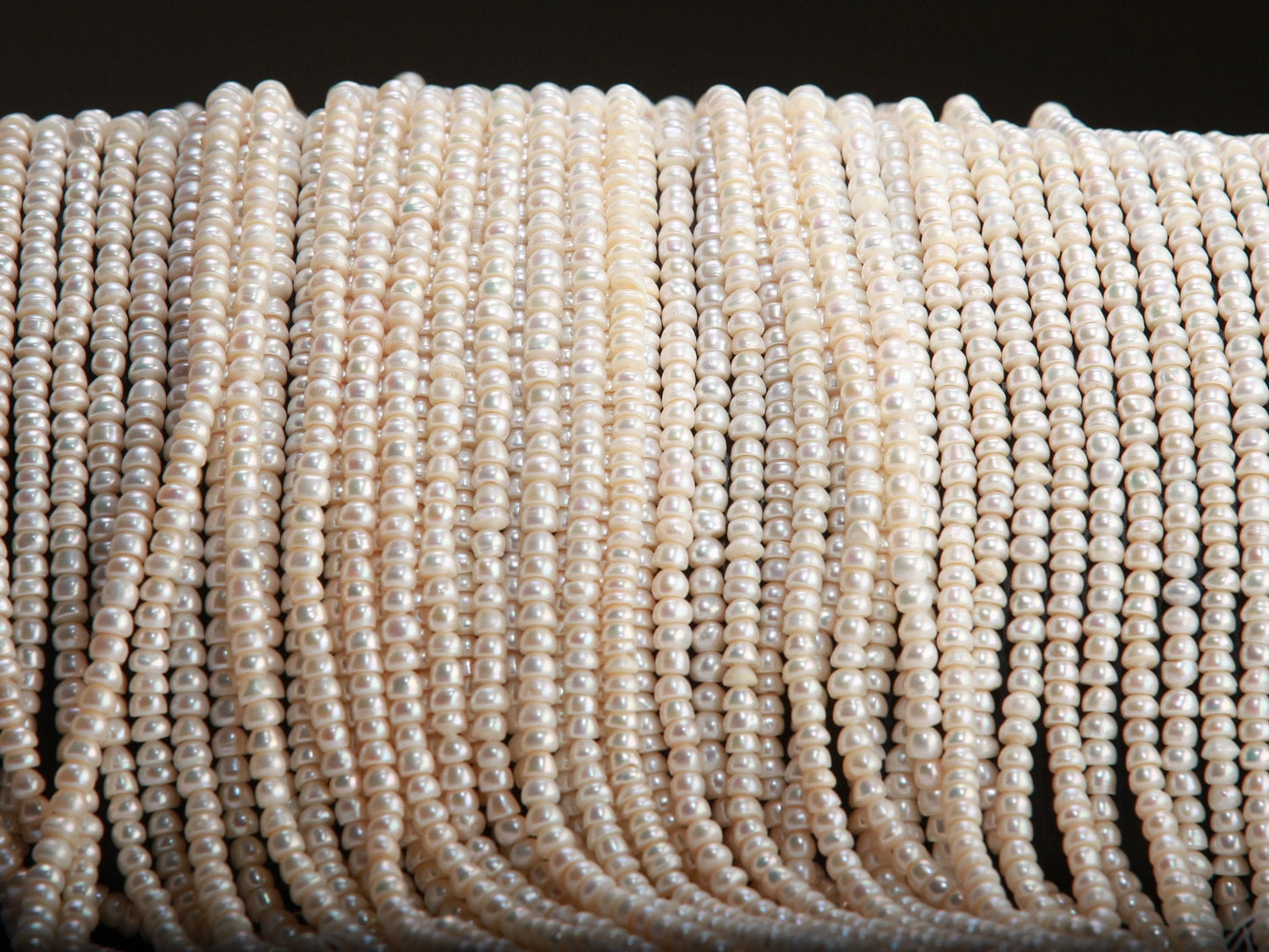 Natural Freshwater Pearl 3x4.5mm Roundel 14” full strand