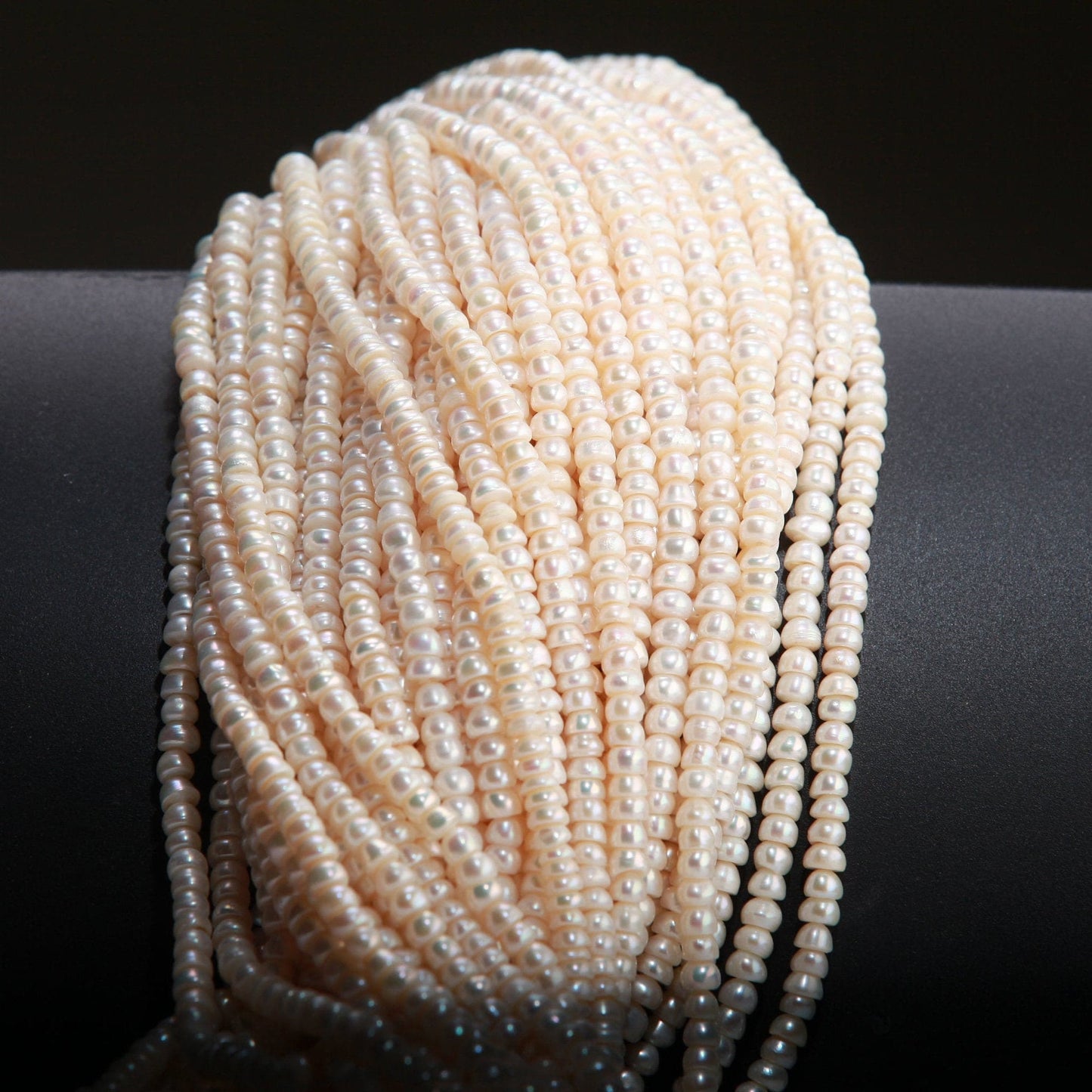 Natural Freshwater Pearl 3x4.5mm Roundel 14” full strand