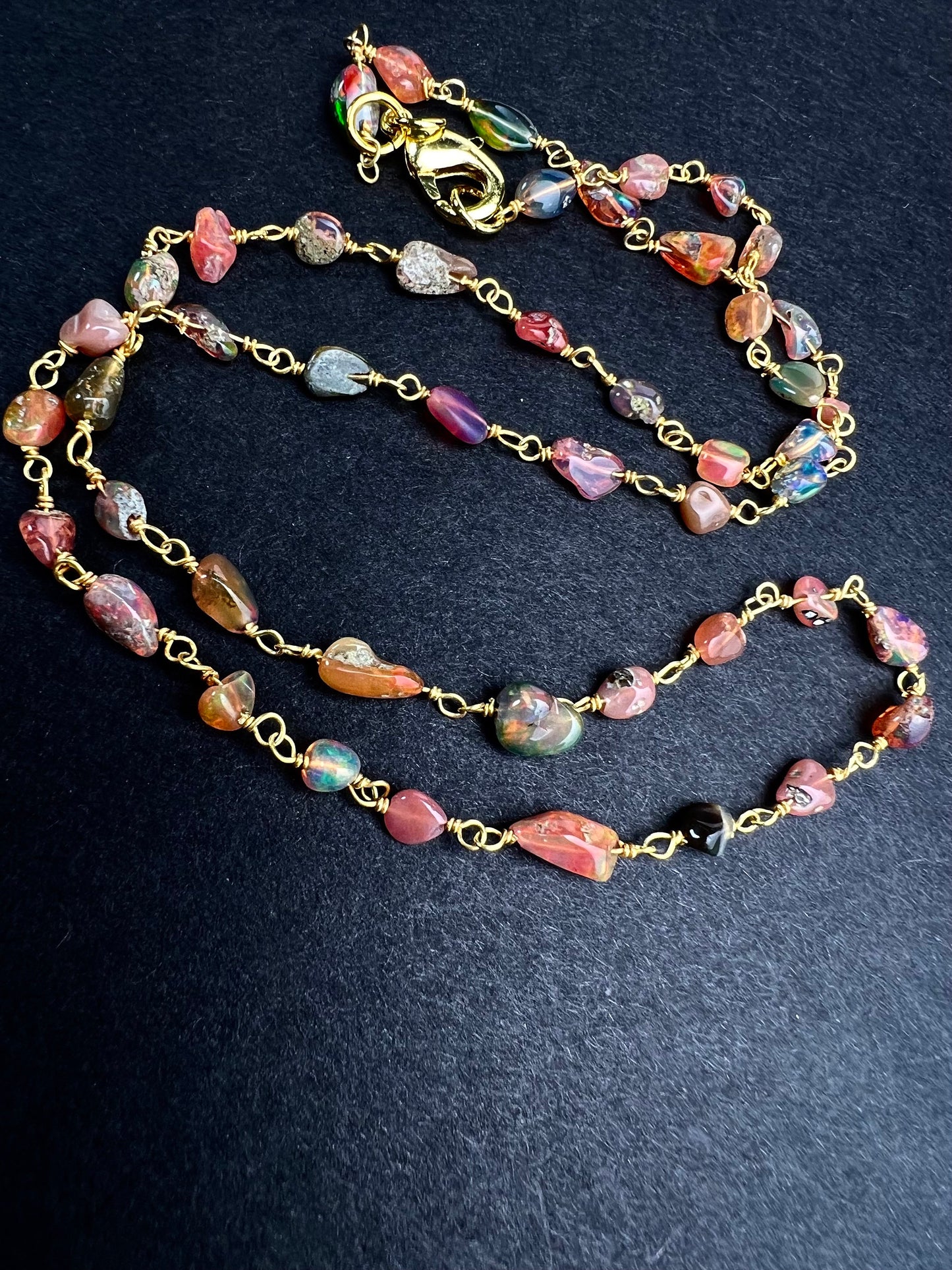 Genuine Ethiopian Fire opal welo opal wire wrapped handmade chain in 22k gold vermeil .