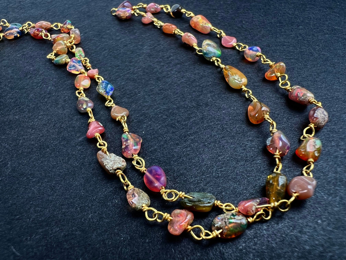 Genuine Ethiopian Fire opal welo opal wire wrapped handmade chain in 22k gold vermeil .