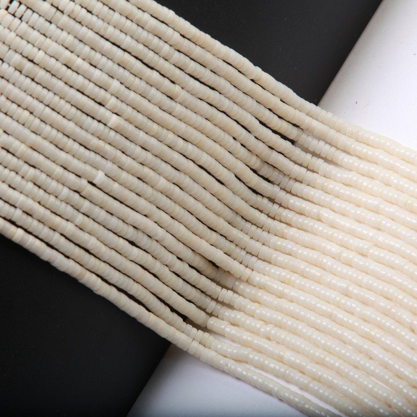 Natural White Bamboo Coral 4mm Heishi Beads 16" Strand