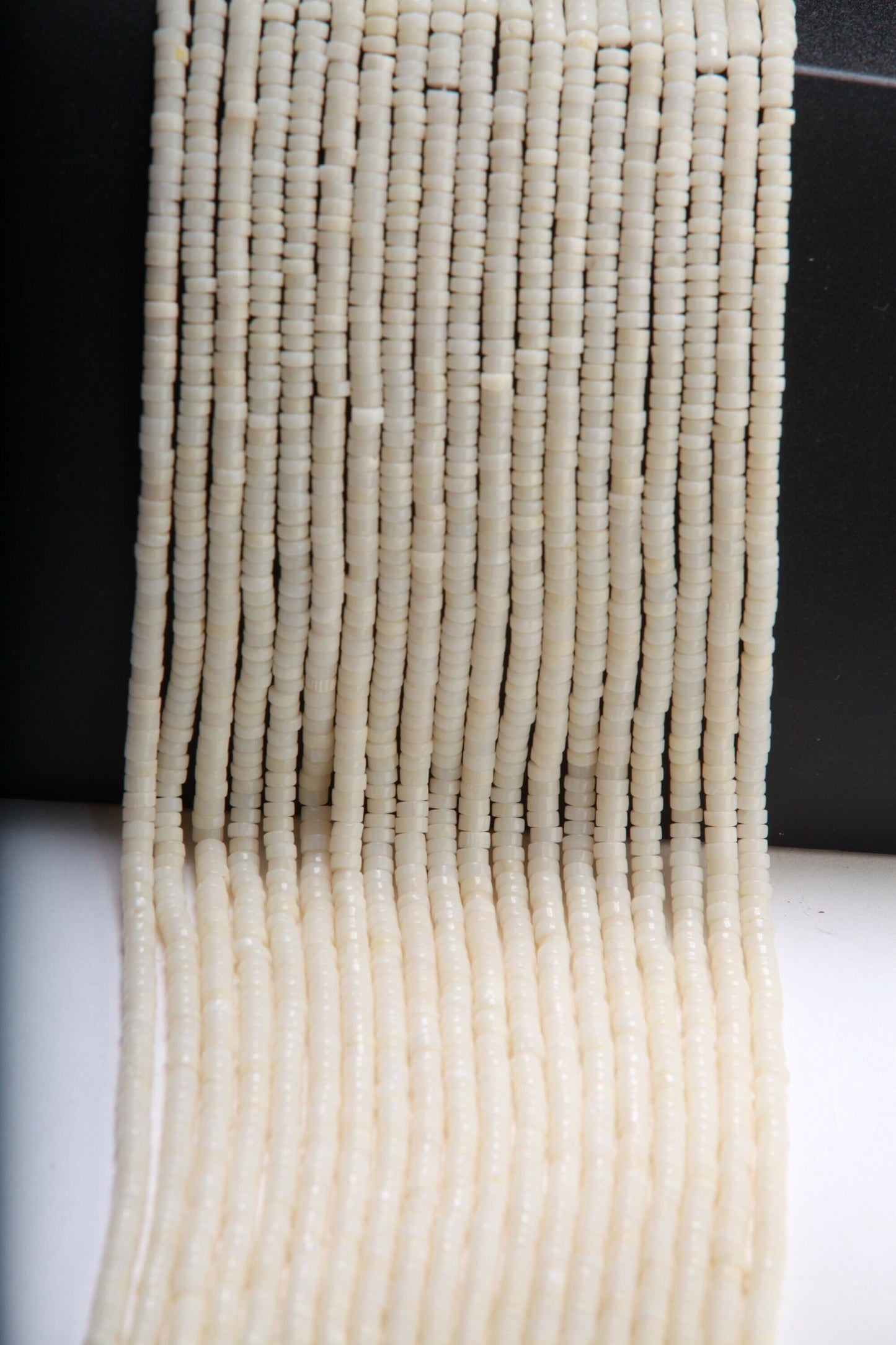 Natural White Bamboo Coral 4mm Heishi Beads 16" Strand