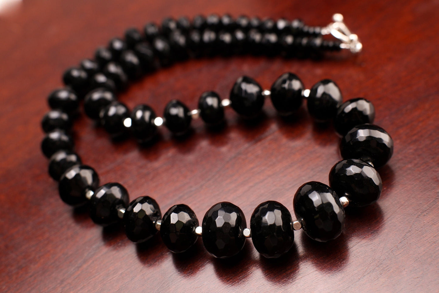 Black Onyx Faceted Graduated Rondelle 7-17mm with Silver Bali Style Spacers And toggle clasp 18" Necklace
