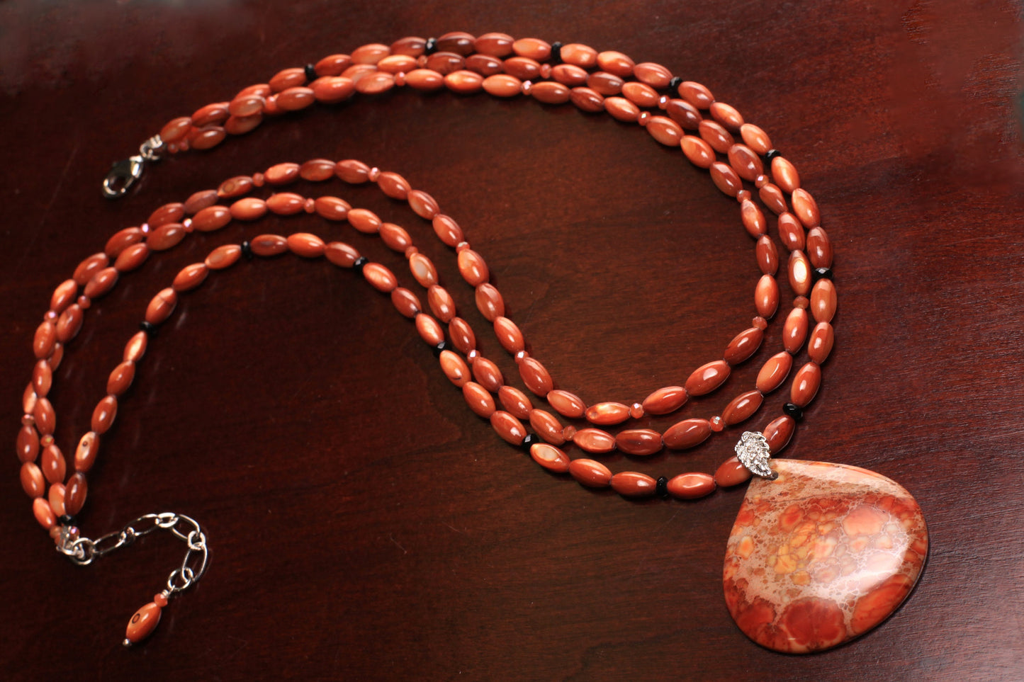 Natural Aqua Terra Jasper Large Teardrop Pendant with natural Mother of Pearl Rice Oval Black Onyx Spacers 3 Line Layer Adjustable Necklace.