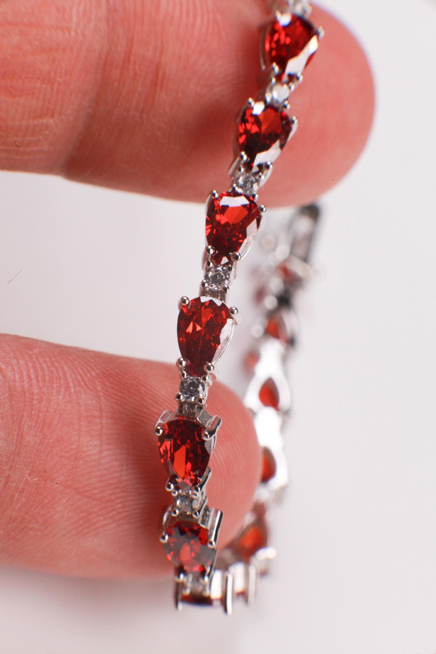 Genuine Garnet Teardrop shape 4x6mm Prong CZ Diamond 925 Sterling Silver Tennis Bracelet 7"with safety clasp. January birthstone, gift