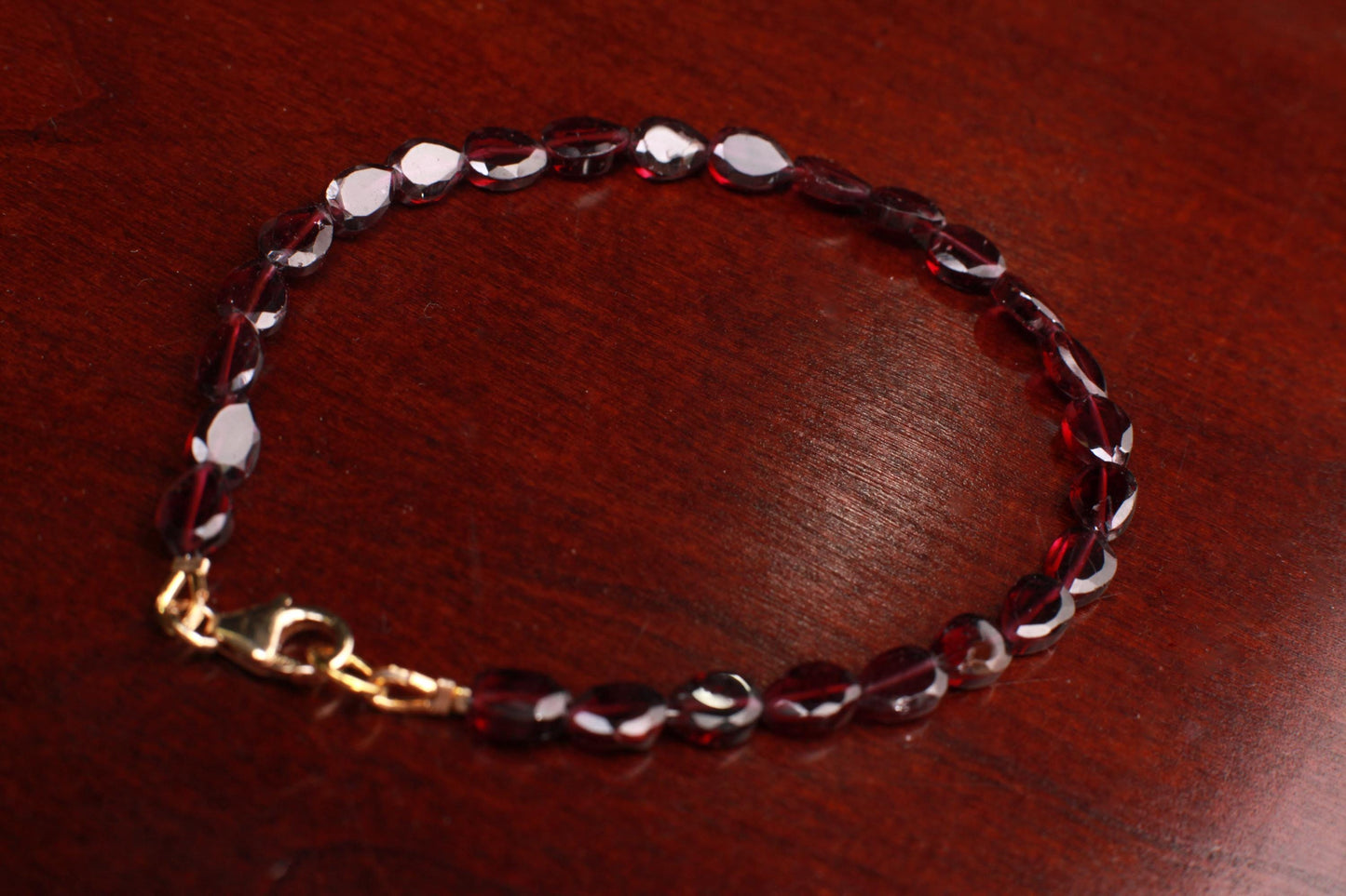 Mozambique Garnet Faceted long oval 4.5x6-6.6mm beaded Bracelet in 14k Gold Filled, or 925 Sterling Silver lobster Clasp and findings,