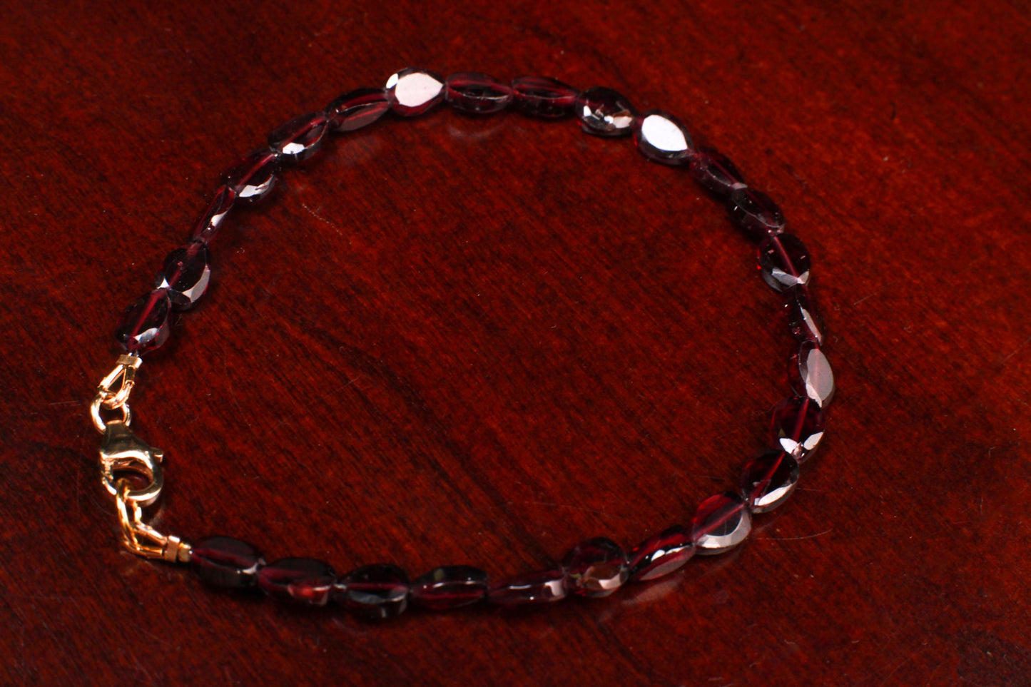 Mozambique Garnet Faceted long oval 4.5x6-6.6mm beaded Bracelet in 14k Gold Filled, or 925 Sterling Silver lobster Clasp and findings,