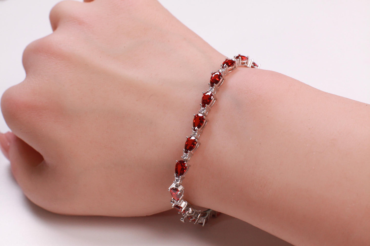 Genuine Garnet Teardrop shape 4x6mm Prong CZ Diamond 925 Sterling Silver Tennis Bracelet 7"with safety clasp. January birthstone, gift
