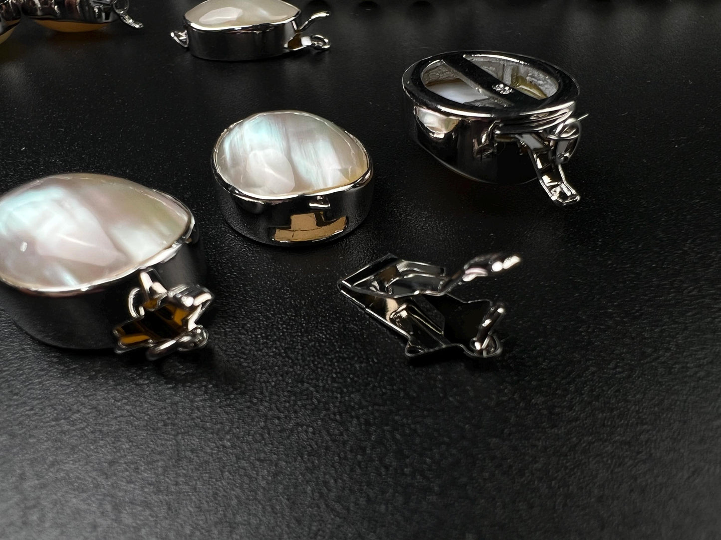 White Mother of Pearl Oval large vintage hand curved push in open Fancy Rhodium Sterling silver clasp.