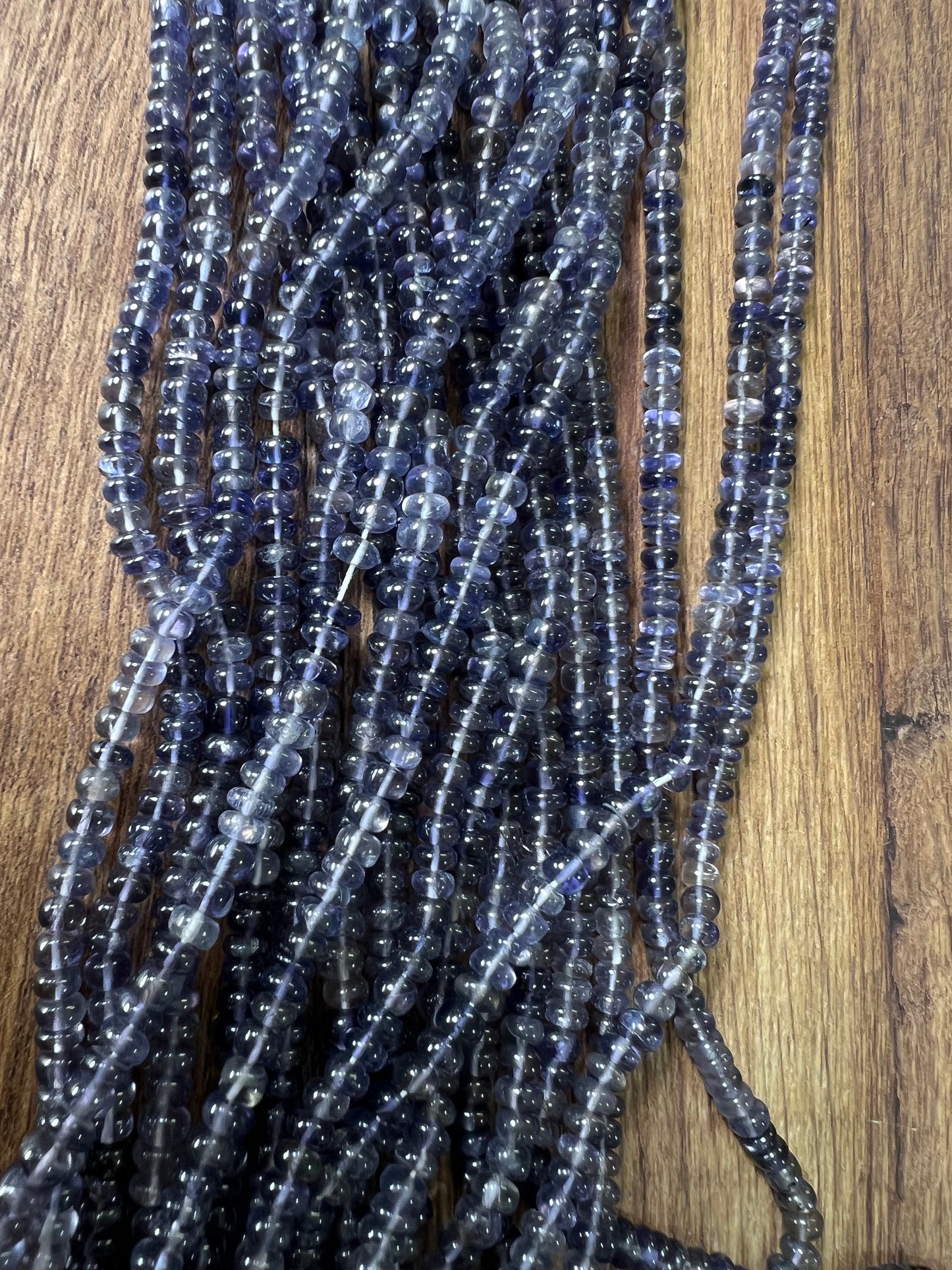 Natural Ombre Iolite Shaded 5-5.5mm large smooth Roundel Iolite rare 6.5” and 13” strand . Beautiful water,Violet blue shaded iolite beads .