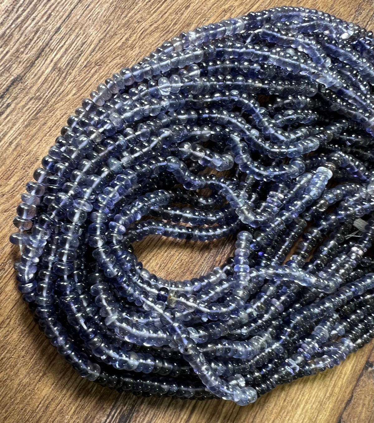 Natural Ombre Iolite Shaded 5-5.5mm large smooth Roundel Iolite rare 6” and 12” strand . Beautiful water,Violet blue shaded iolite beads .