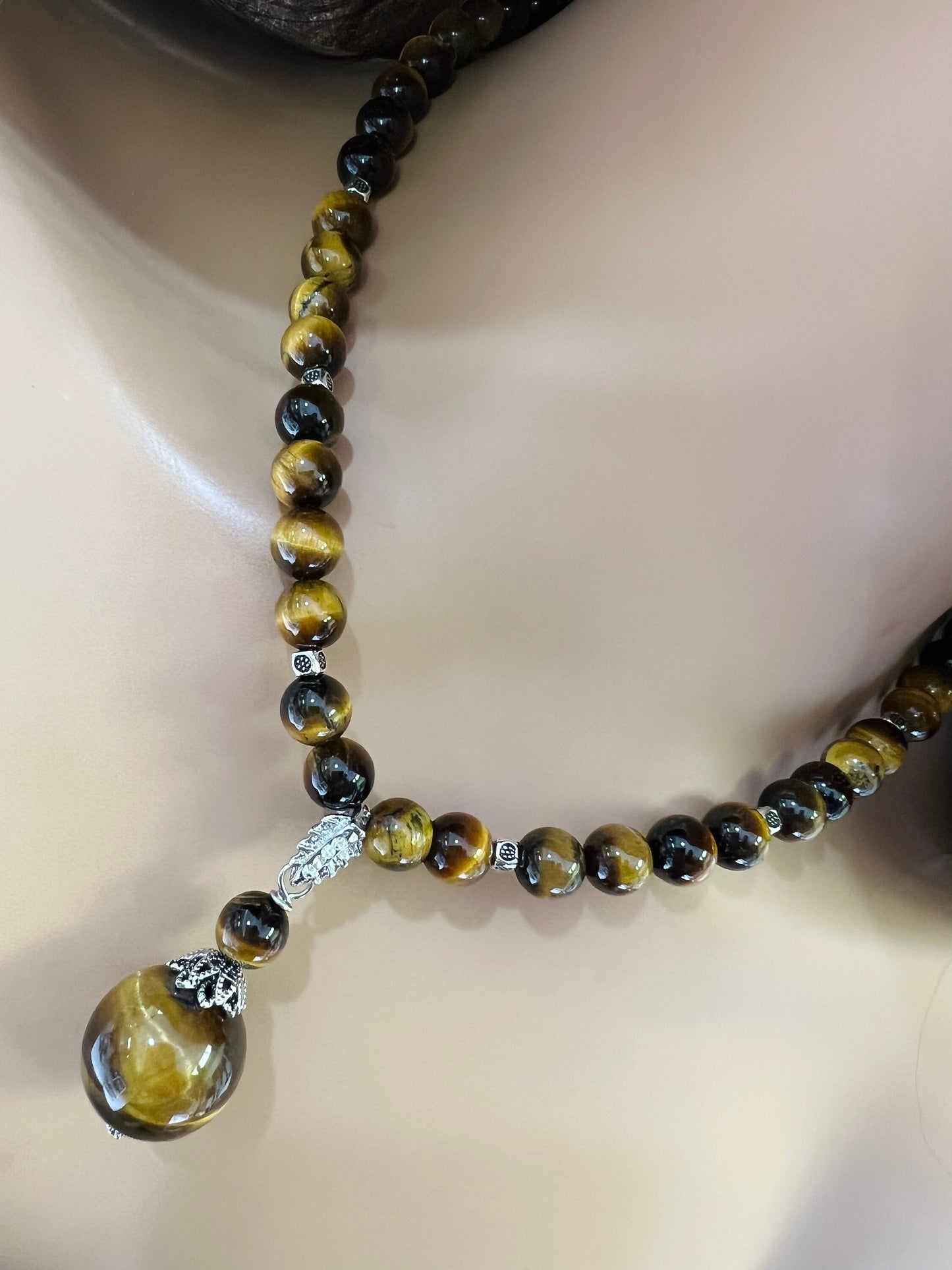 Brown Tiger Eye 8mm smooth round AAA with matching tiger eye 18mm pendant rhodium silver spacer and S hook clasp 18” necklace