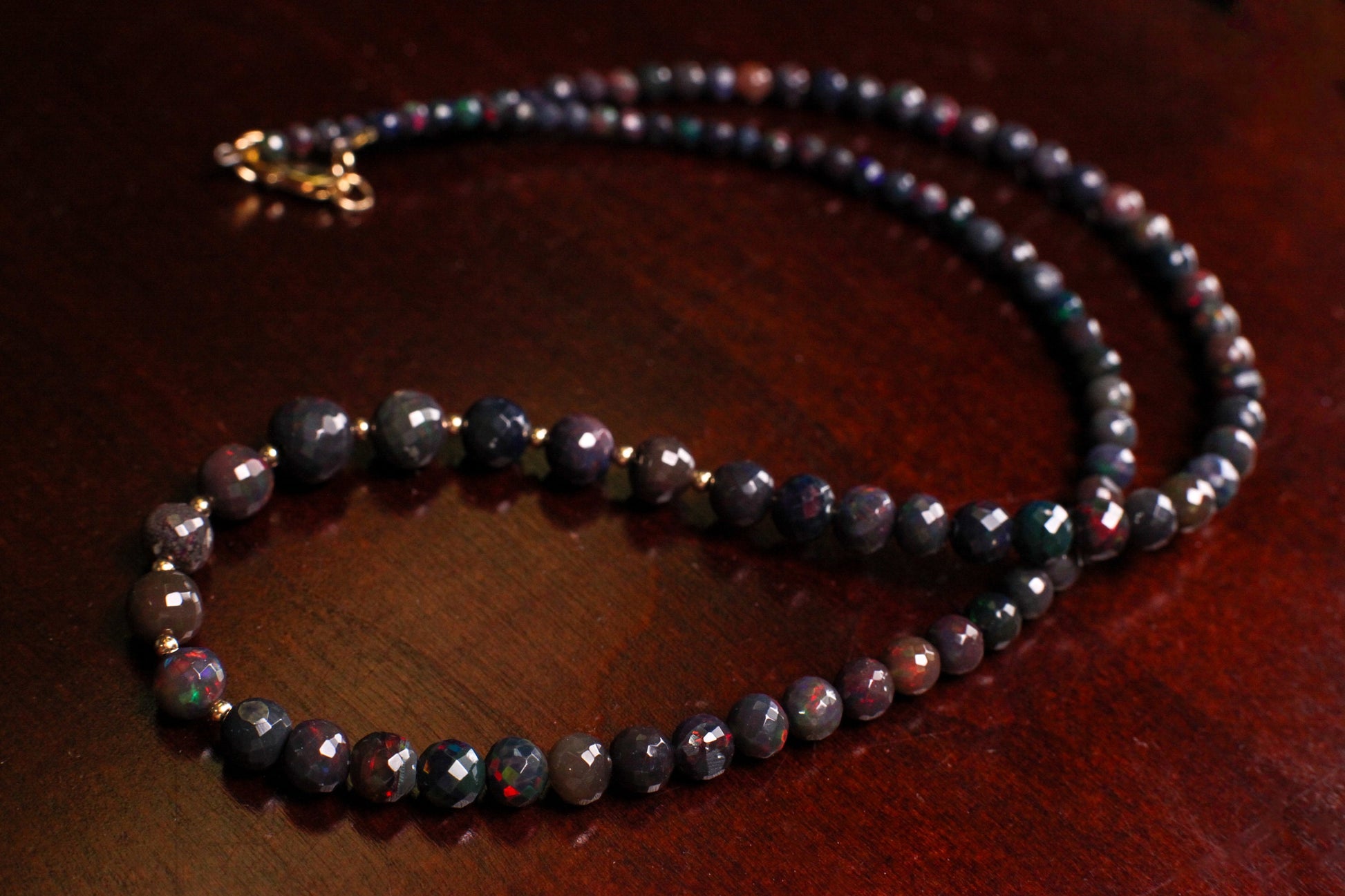 Natural Black Ethiopian Welo Fire Opal Faceted Round 3-7mm Graduated Necklace. 14K Gold Filled Necklace