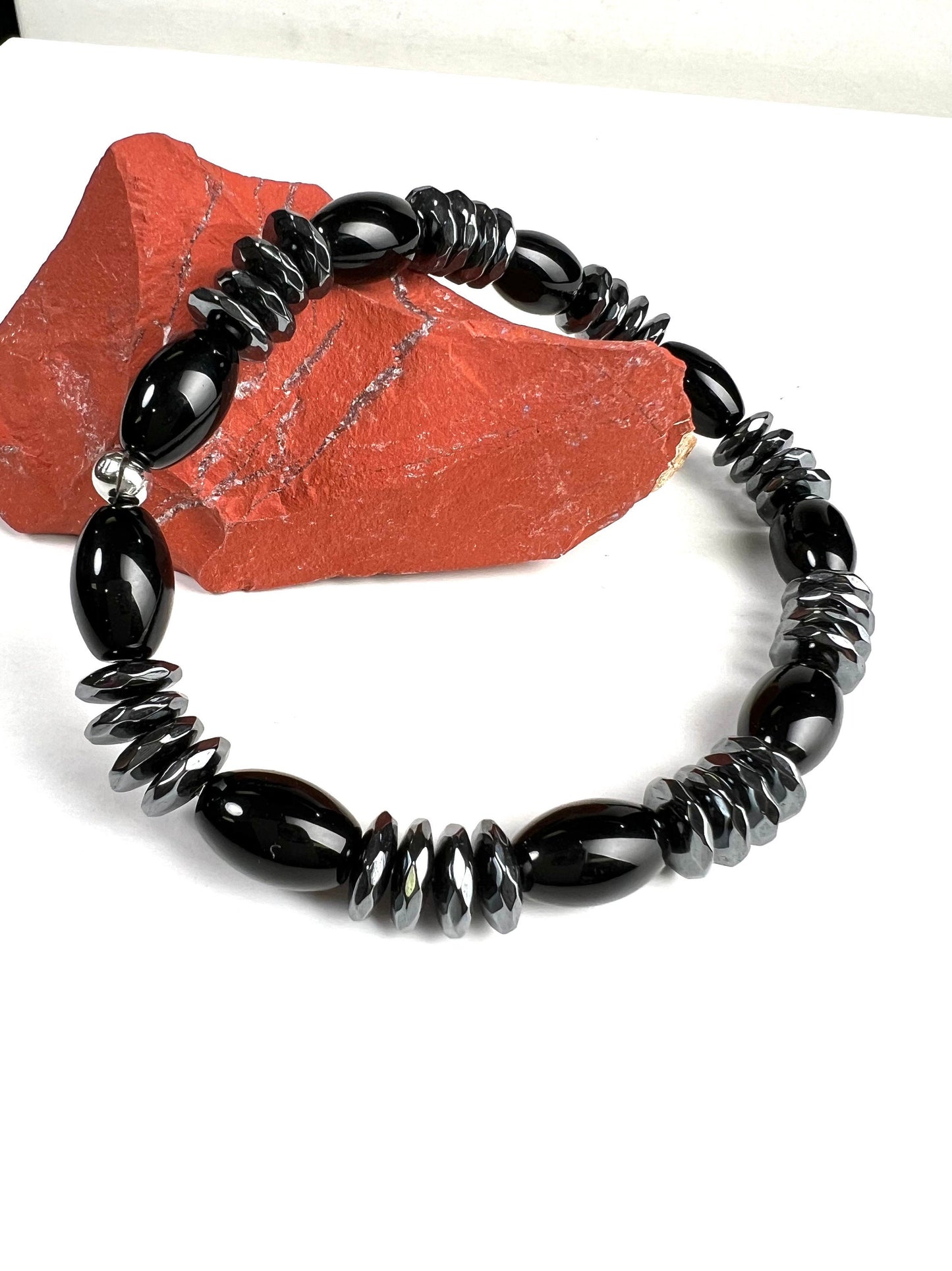 Black Onyx smooth oval with 10mm hematite faceted disc roundel AAA quality beaded Stretchy Bracelet. Man’s gift energy protection strength