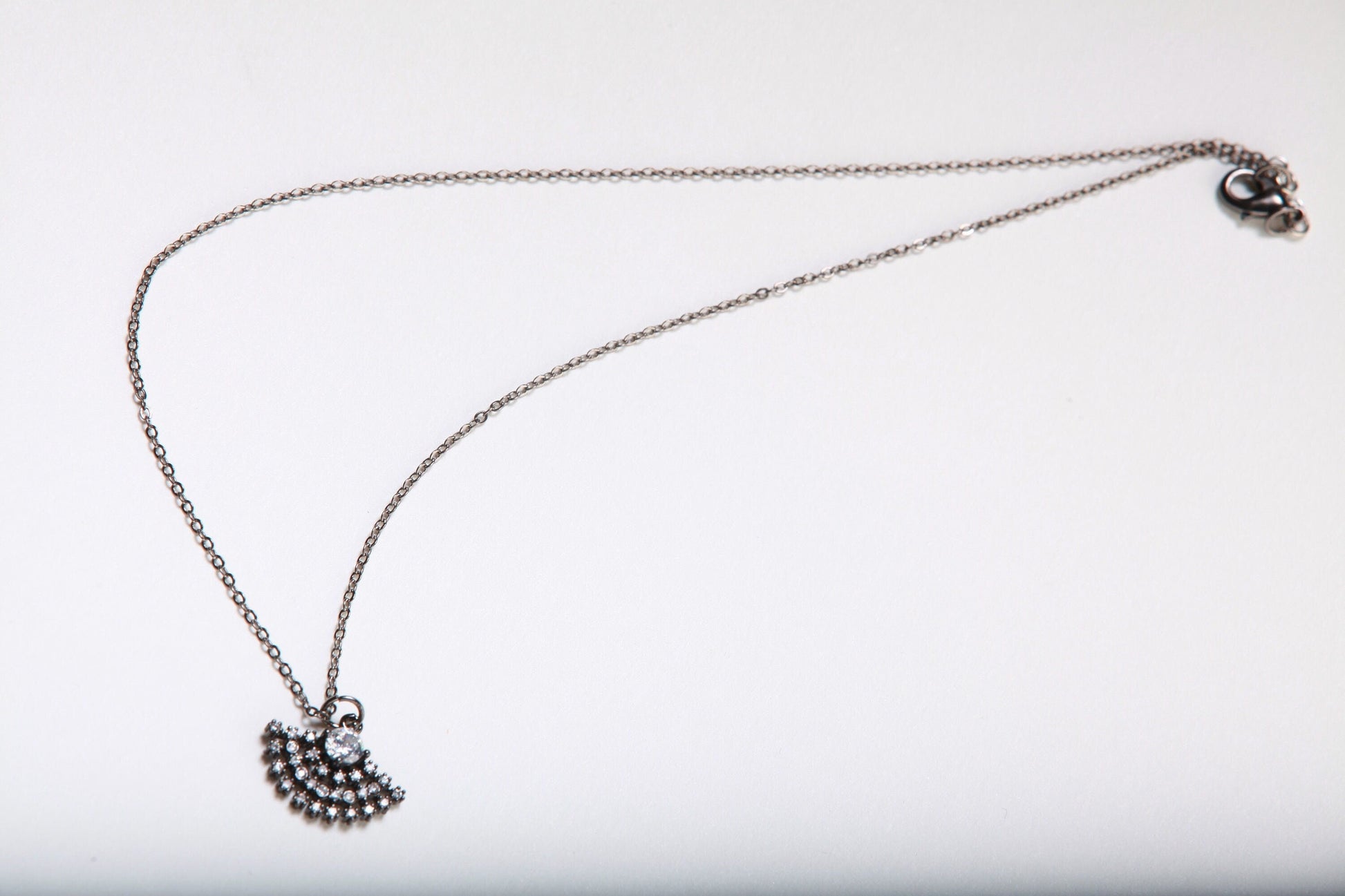 Cubic Zirconia Oxidized and Rhinestone Diamond Ball Micro Pave Fan Charm Necklace. Available in 16&quot;, 18&quot; and 20&quot;