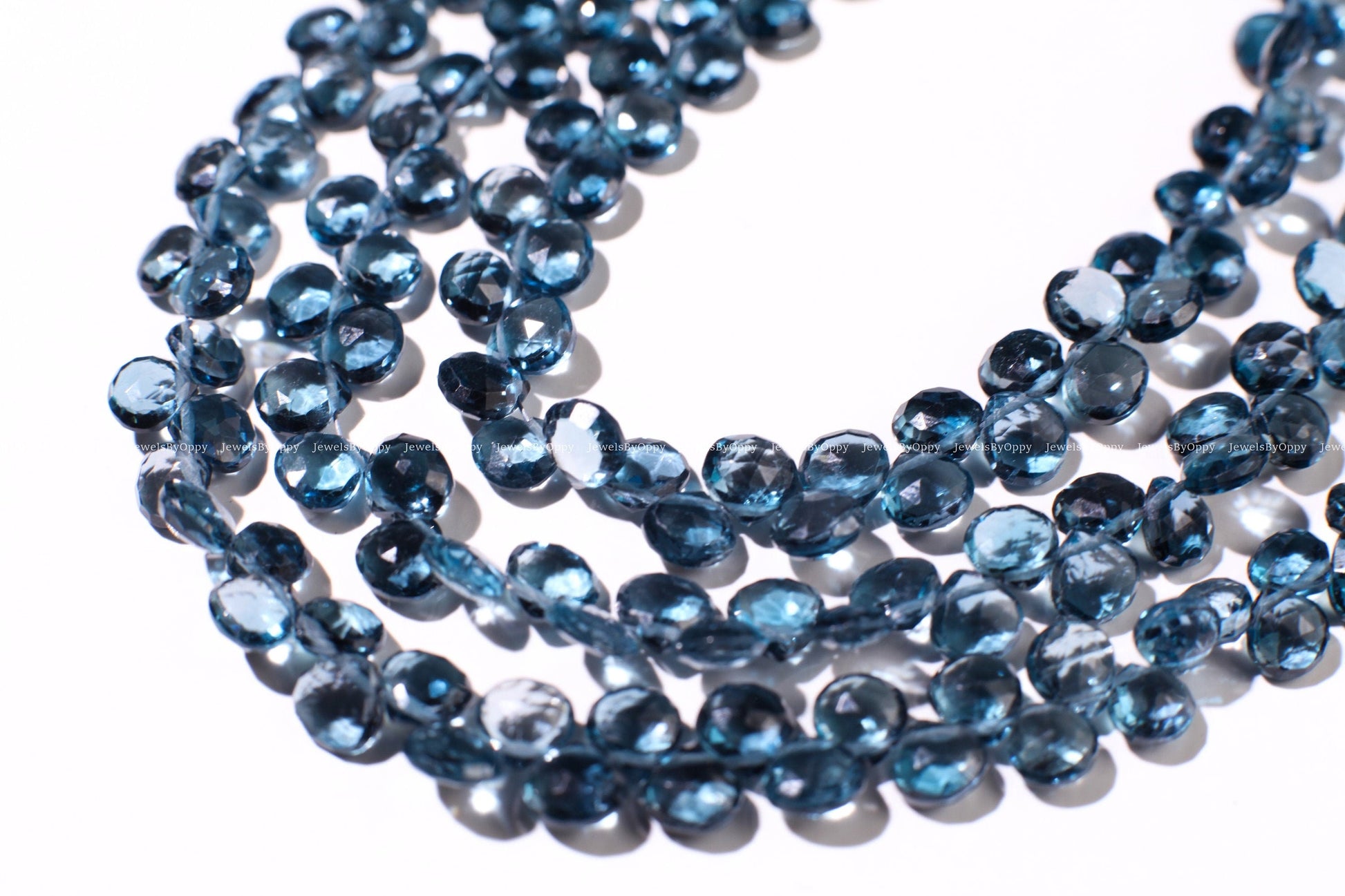 Natural London Blue Topaz heart shape drop 6-6.5mm Faceted Diamond Cut pear drop Beads, High Quality Natural London Blue Topaz.