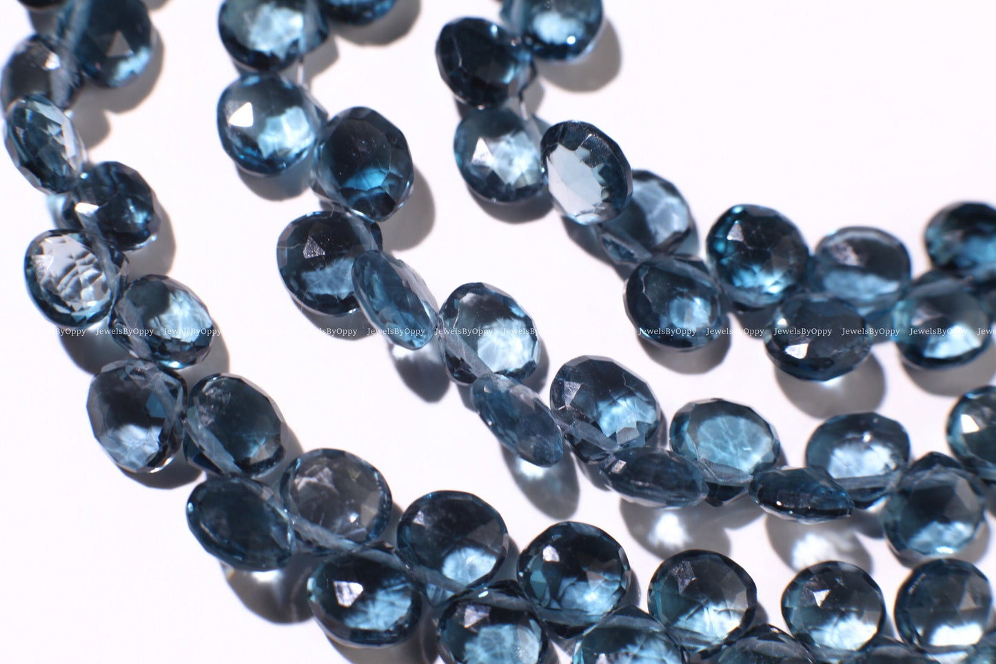 Natural London Blue Topaz heart shape drop 6-6.5mm Faceted Diamond Cut pear drop Beads, High Quality Natural London Blue Topaz.