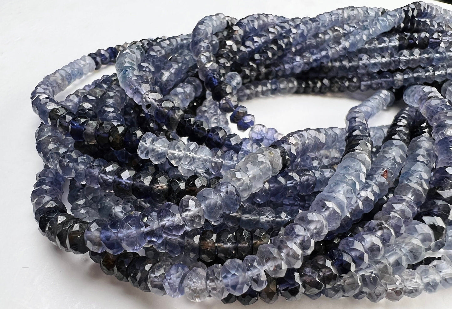 Natural Ombre Iolite Shaded 5mm large faceted Roundel Iolite rare 8” and 16” strand . Beautiful water blue shaded iolite beads .