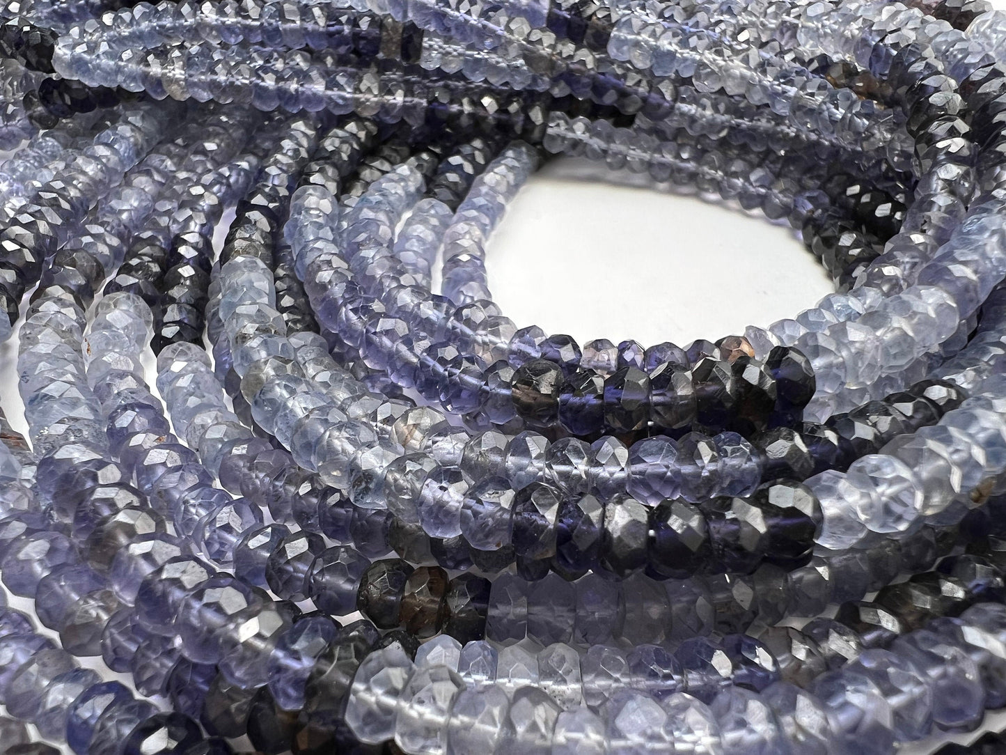 Natural Ombre Iolite Shaded 5mm large faceted Roundel Iolite rare 8” and 16” strand . Beautiful water blue shaded iolite beads .