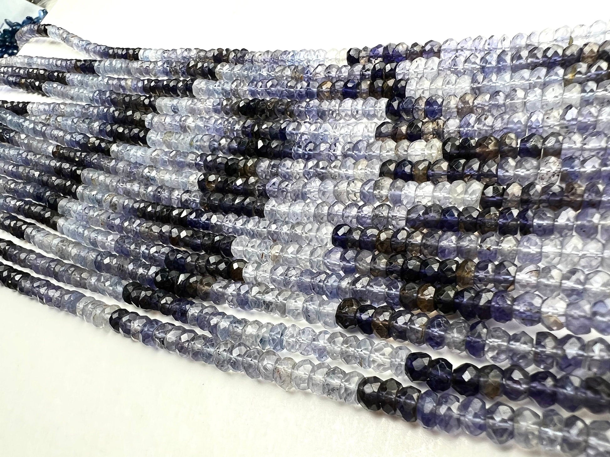 Natural Ombre Iolite Shaded 5mm large faceted Roundel Iolite rare 8” and 16” strand . Beautiful water blue shaded iolite beads .