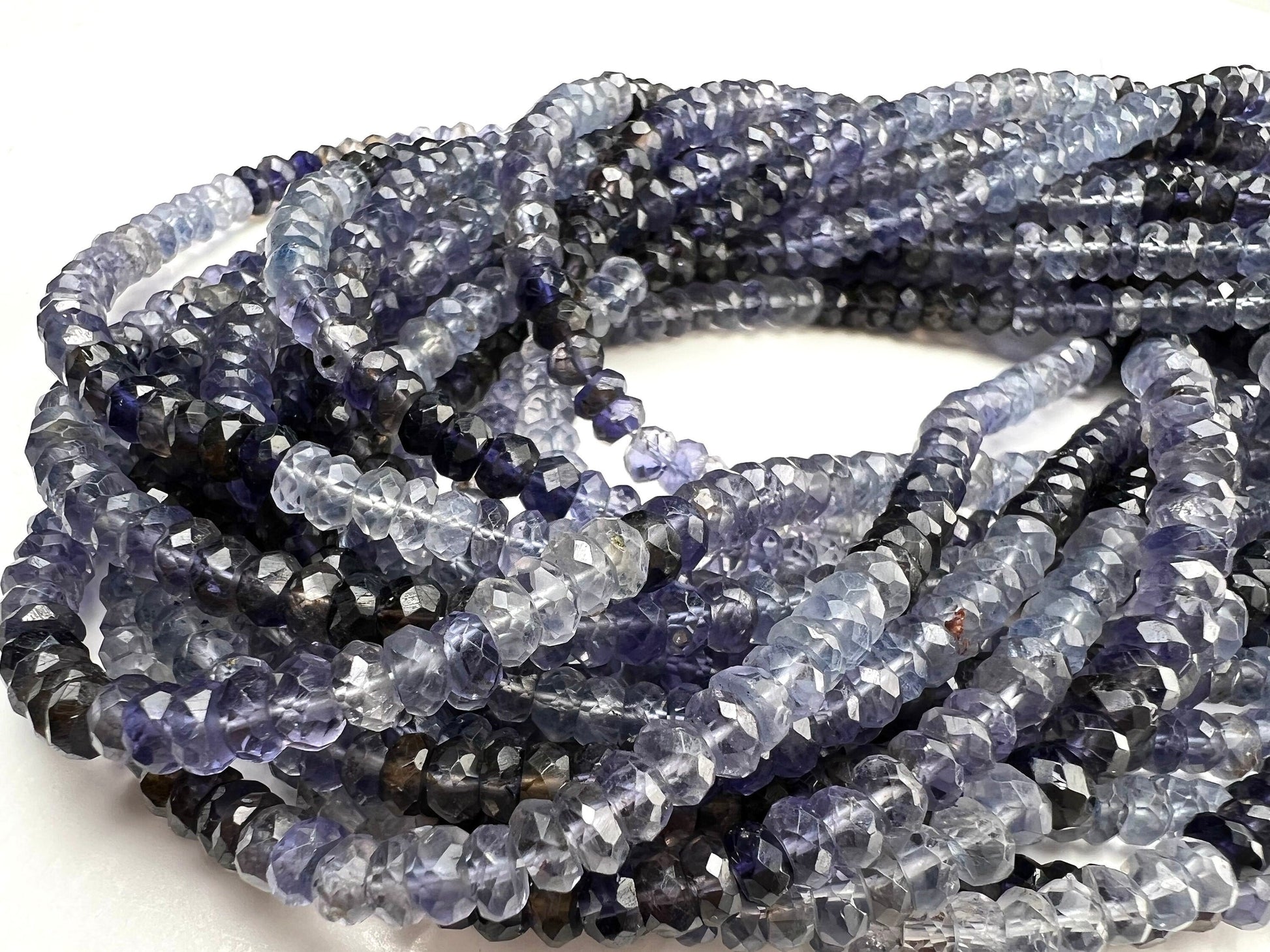 Natural Ombre Iolite Shaded 5mm large faceted Roundel Iolite rare 8” and 16” strand . Beautiful water blue shaded iolite beads .