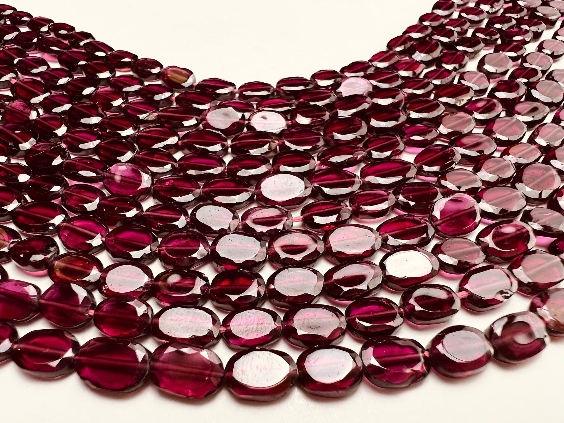 Mozambique Garnet AAA Smooth Flat Oval 4.5-5x6-6.5 Jewelry Making, Rich Merlot Natural Gemstone beads 14” strand . Single or bulk