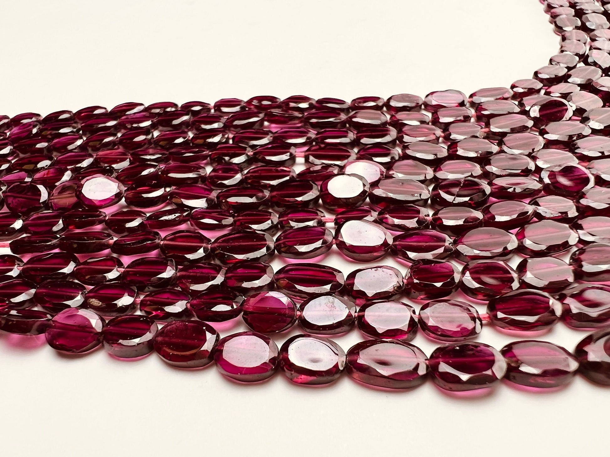 Mozambique Garnet AAA Smooth Flat Oval 4.5-5x6-6.5 Jewelry Making, Rich Merlot Natural Gemstone beads 14” strand . Single or bulk