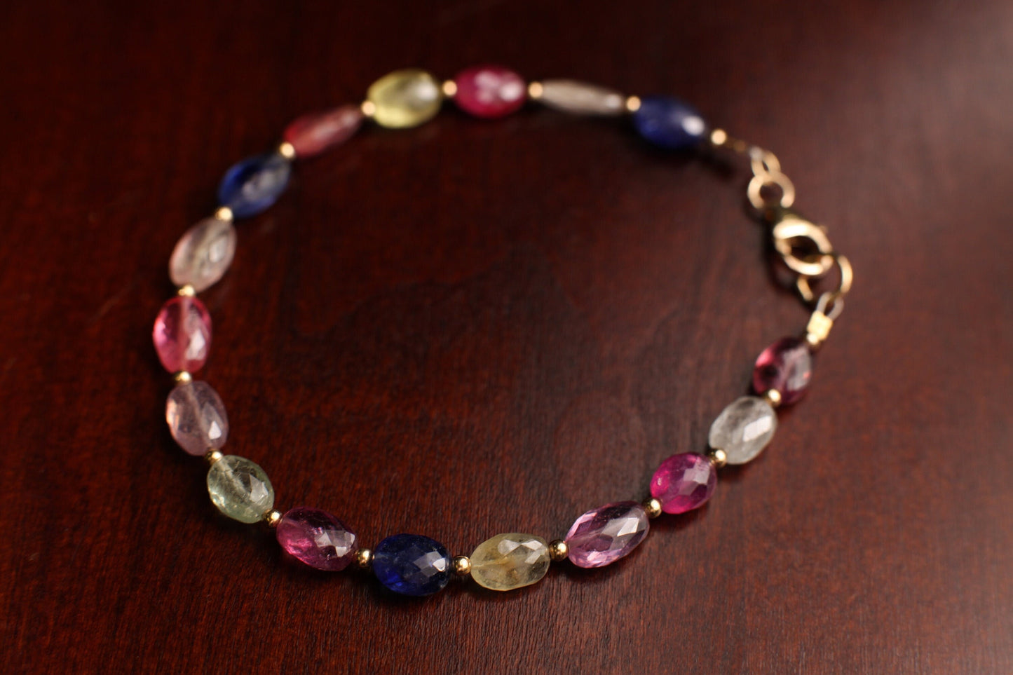 Natural Multi Sapphire 5x7mm Faceted Puffed Oval AAA clear quality Gemstone in 14k Gold Filled spacer and clasp Bracelet. Precious Gift .