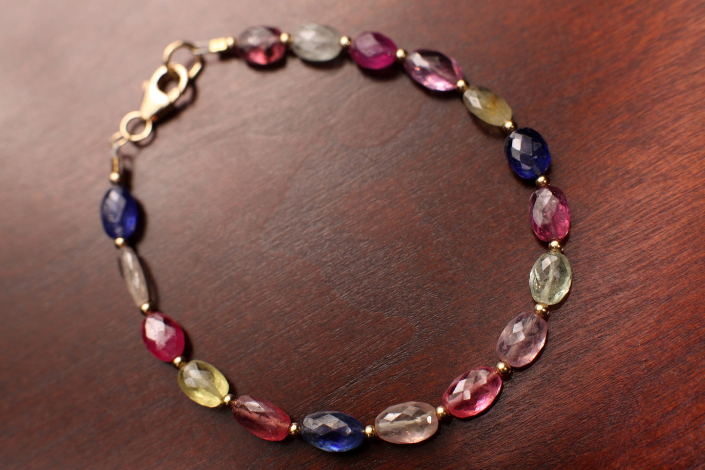 Natural Multi Sapphire 5x7mm Faceted Puffed Oval AAA clear quality Gemstone in 14k Gold Filled spacer and clasp Bracelet. Precious Gift .