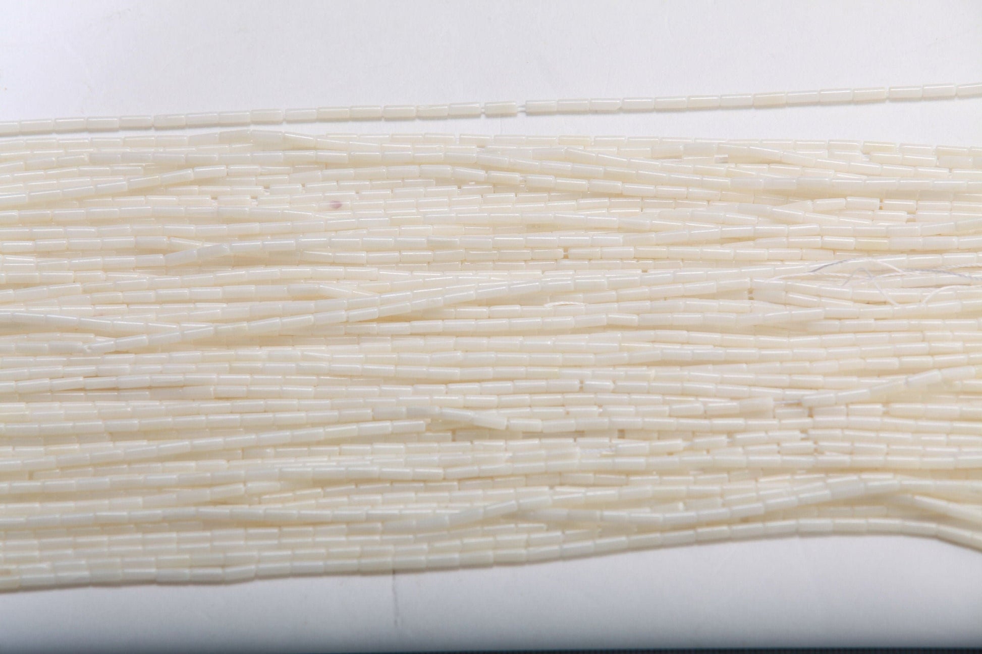 White Bamboo Coral 2x5mm Tube 16" Strand