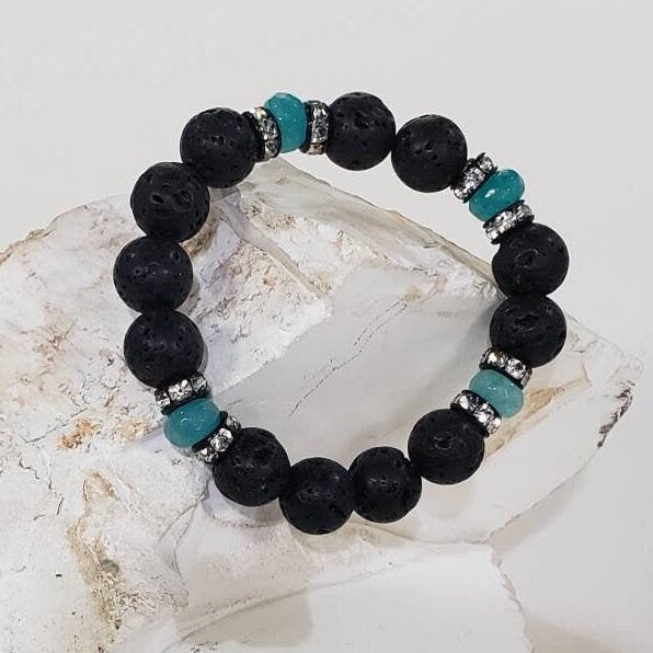Natural lava 10mm round bead accent with ocean blue quartz and rhinestones roundel stretchy Bracelet. Healing crystal Chakra gift .