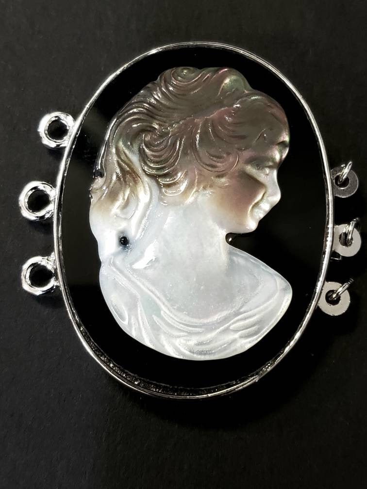 Black lip Mother of Pearl Cameo 3 loop clasp ,39x41Mm large vintage hand curved over Black Onyx surface Rhodium silver clasp .