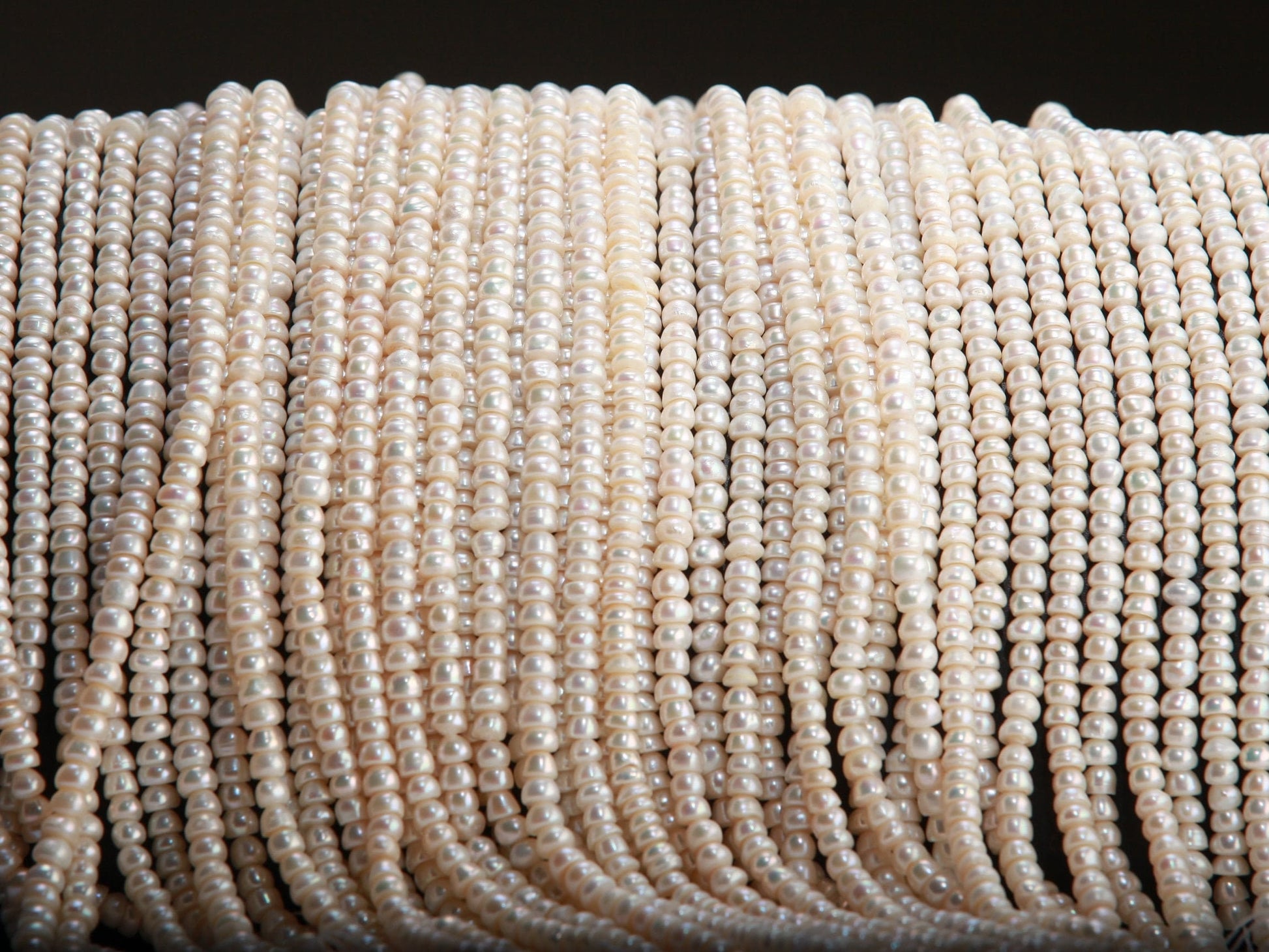 Natural Freshwater Pearl 3x4.5mm Roundel 14” full strand