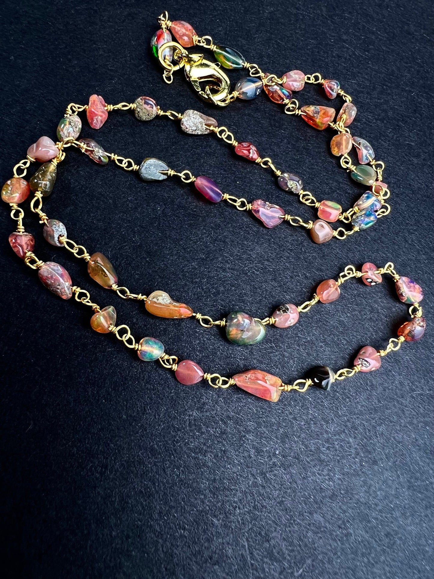 Genuine Ethiopian Fire opal welo opal wire wrapped handmade chain in 22k gold vermeil .