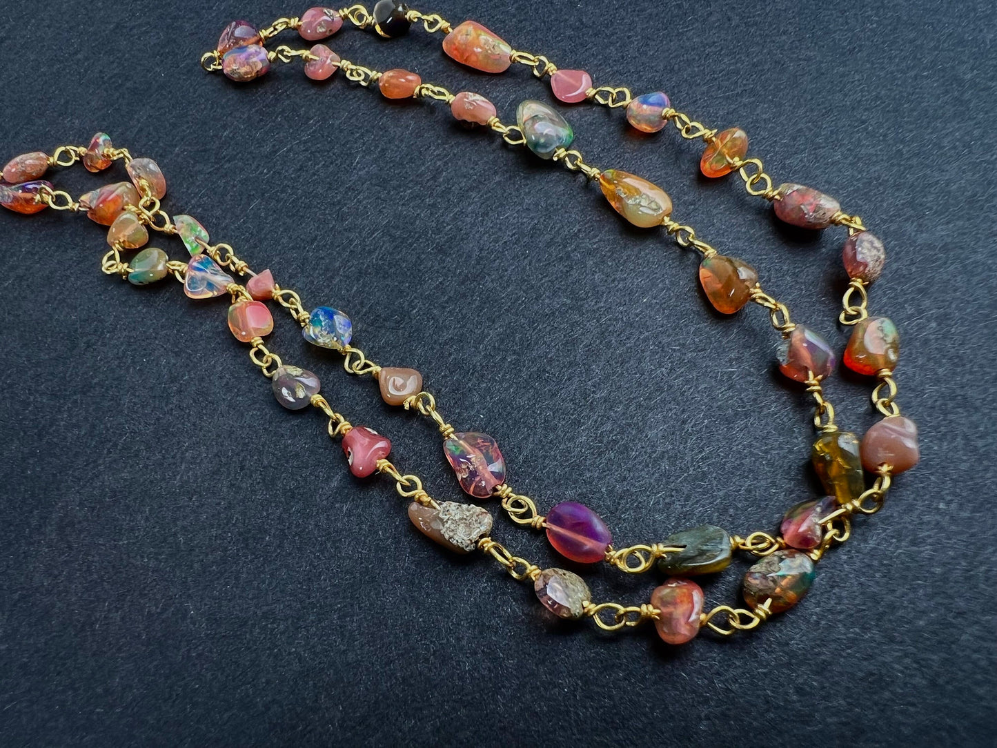 Genuine Ethiopian Fire opal welo opal wire wrapped handmade chain in 22k gold vermeil .