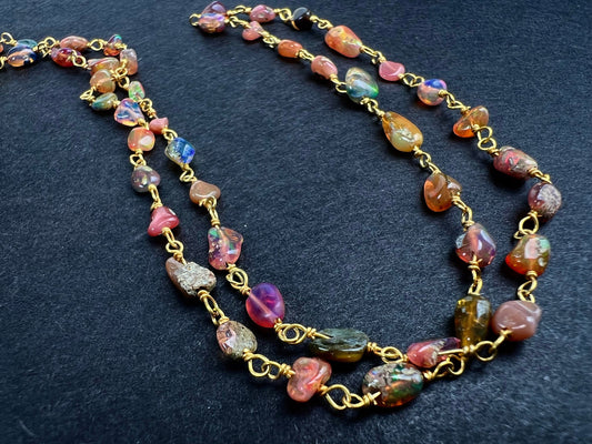 Genuine Ethiopian Fire opal welo opal wire wrapped handmade chain in 22k gold vermeil .