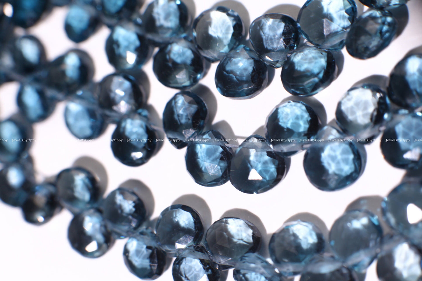 Natural London Blue Topaz heart shape drop 6-6.5mm Faceted Diamond Cut pear drop Beads, High Quality Natural London Blue Topaz.
