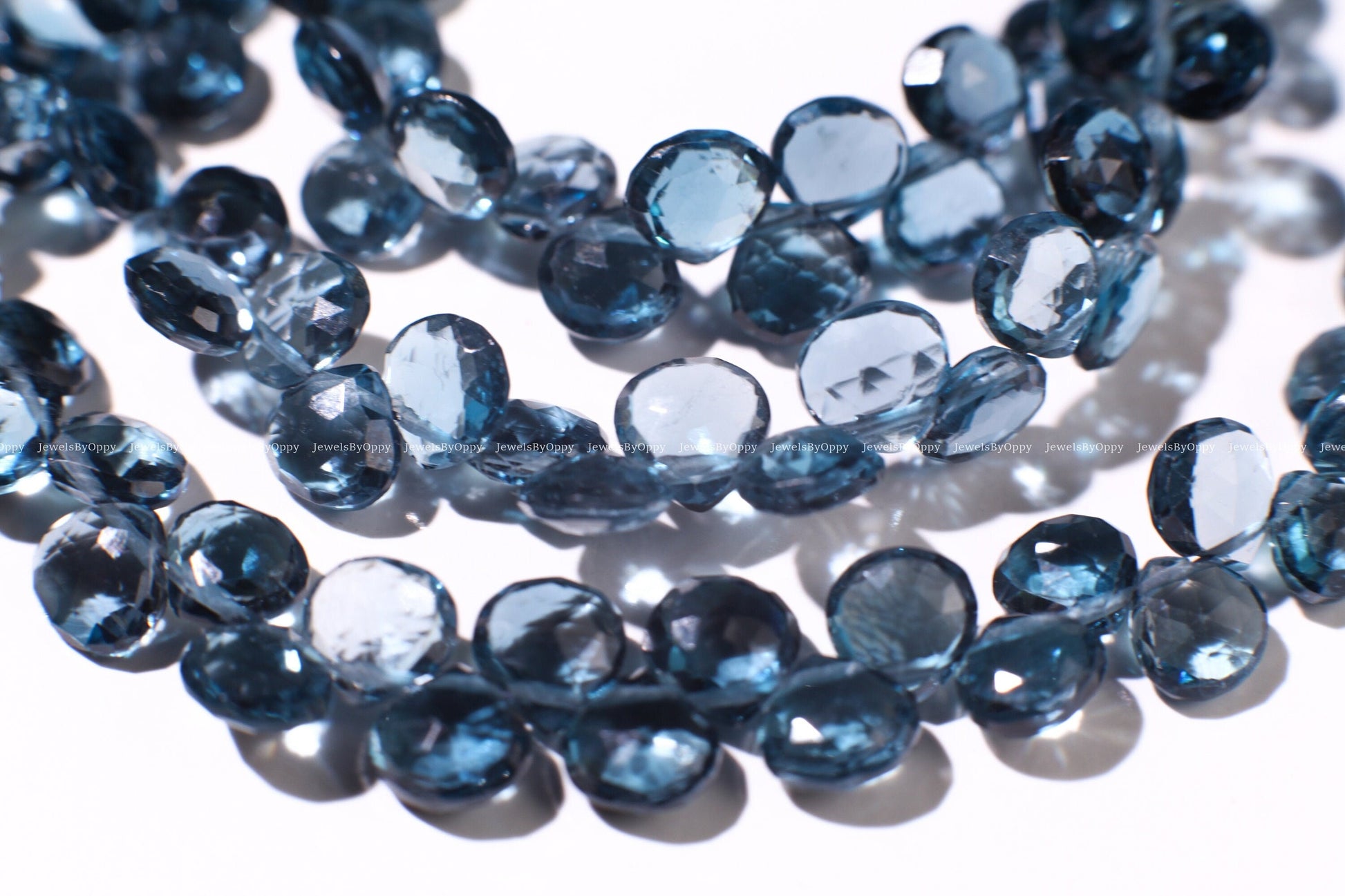 Natural London Blue Topaz heart shape drop 6-6.5mm Faceted Diamond Cut pear drop Beads, High Quality Natural London Blue Topaz.