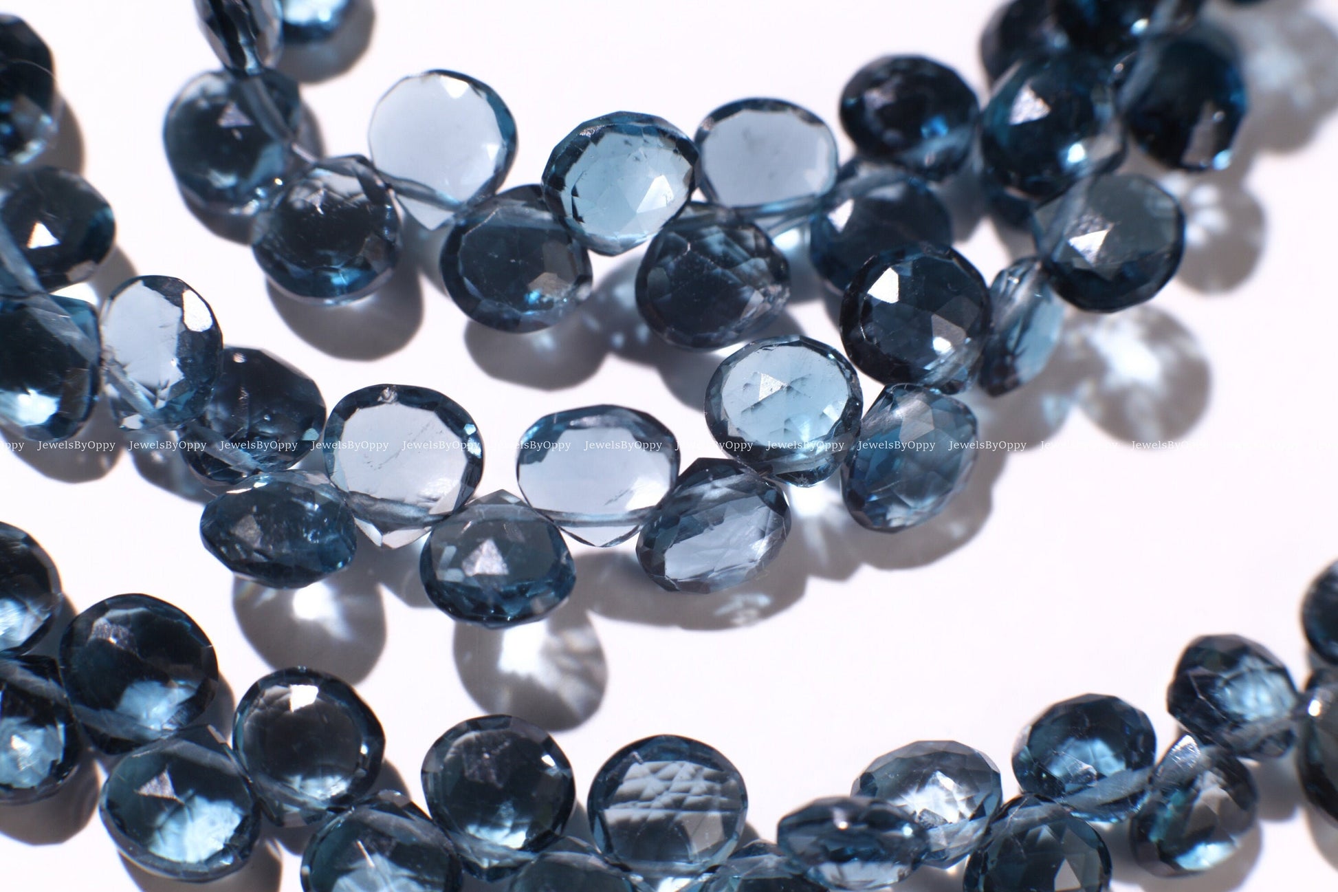 Natural London Blue Topaz heart shape drop 6-6.5mm Faceted Diamond Cut pear drop Beads, High Quality Natural London Blue Topaz.