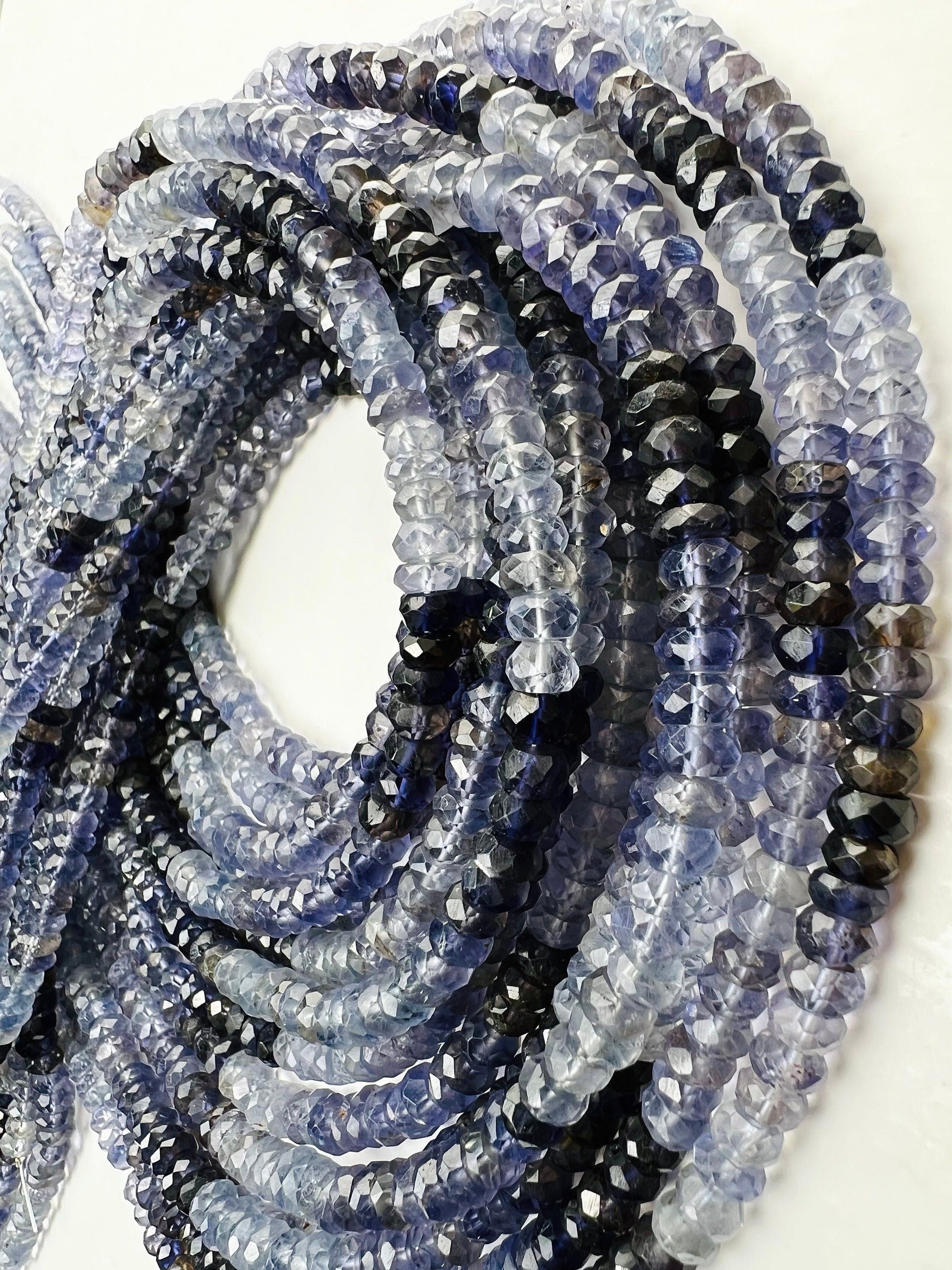 Natural Ombre Iolite Shaded 5mm large faceted Roundel Iolite rare 8” and 16” strand . Beautiful water blue shaded iolite beads .