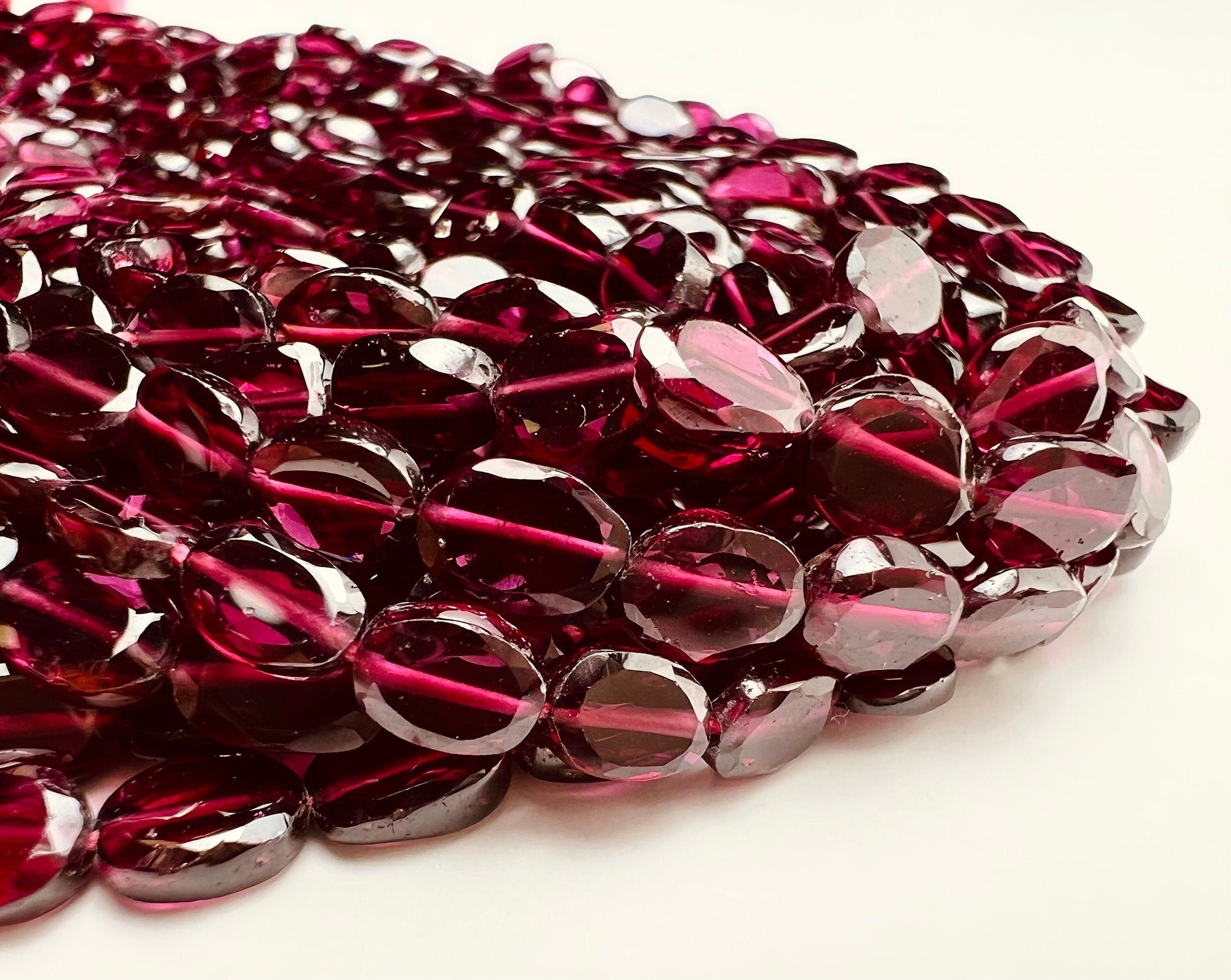 Mozambique Garnet AAA Smooth Flat Oval 4.5-5x6-6.5 Jewelry Making, Rich Merlot Natural Gemstone beads 14” strand . Single or bulk