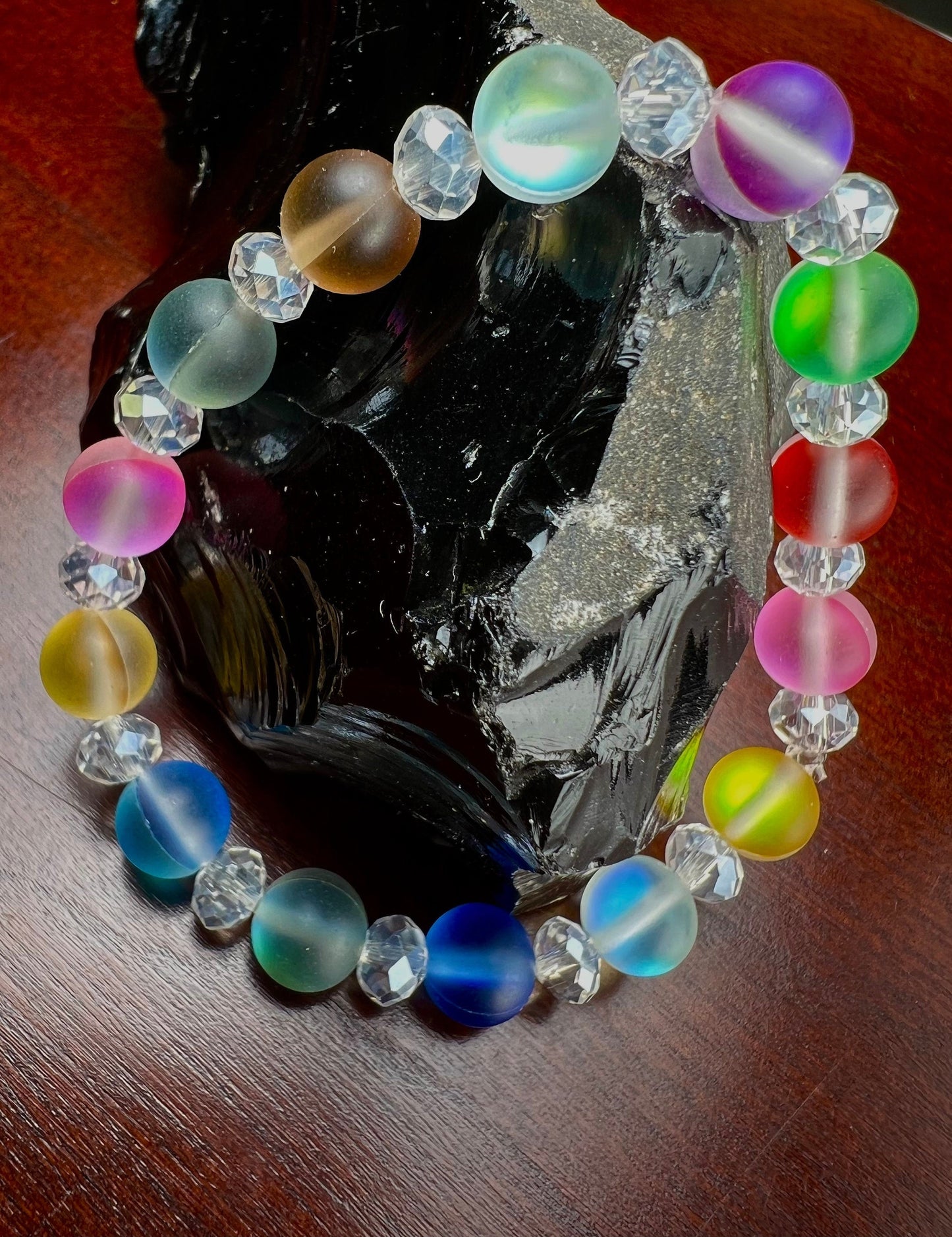 Multi color Angel Aura Quartz Mermaid Glow bead 8mm Matte smooth round bead accents with sparkly crystal roundel stretchy Bracelet. Rainbow